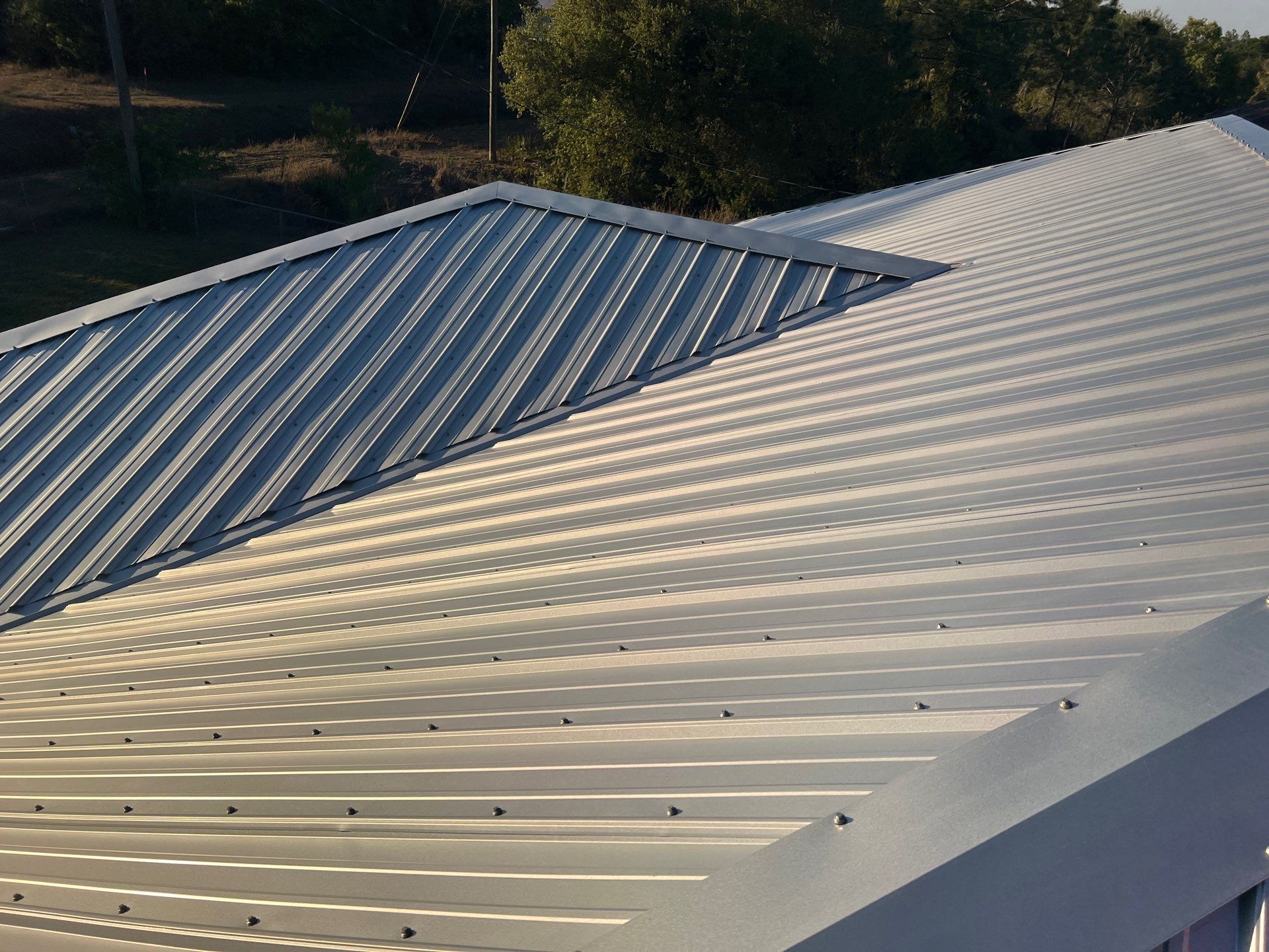Residential Roofing Installation using Durabull Classic Rib Panel by Durabilis Roofing INC
