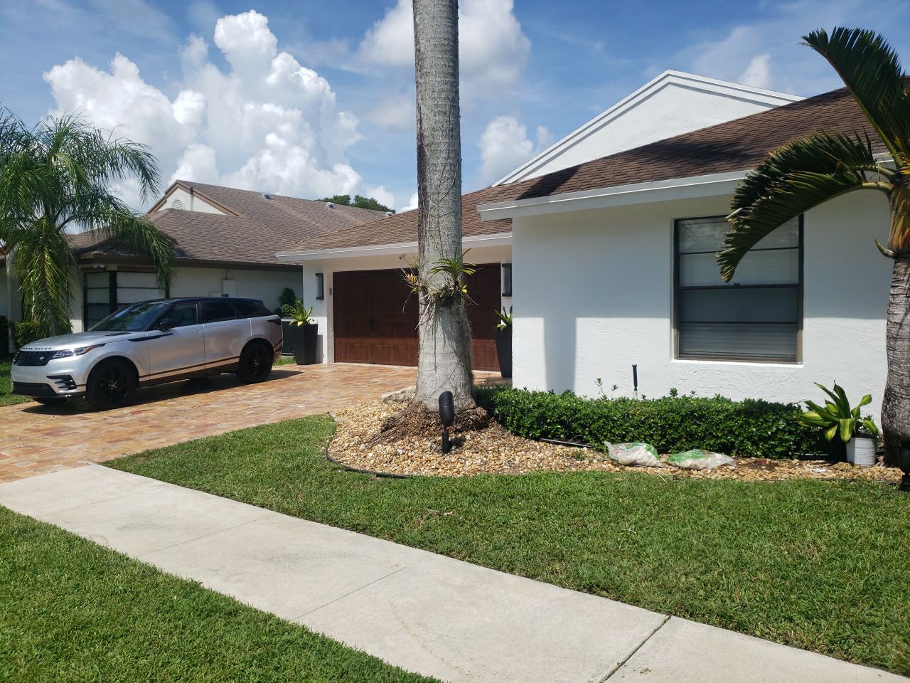 Residential Roofing Installation using 1" Nail strip metal roof by BLUES BROTHERS CONSTRUCTION CORP