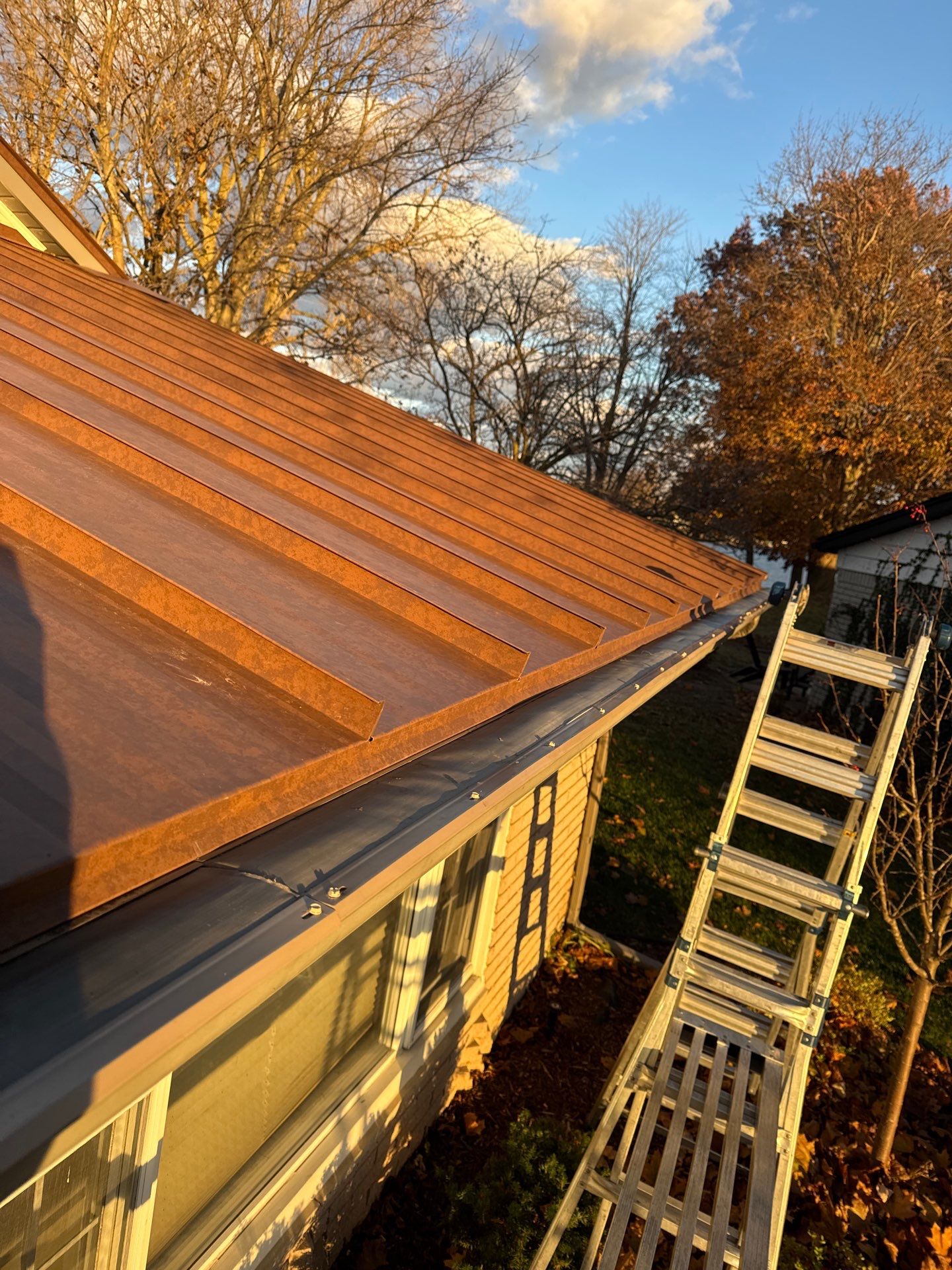 Roof Replacement using MS Standing Seam Roof Western Rust by 180 Contractors