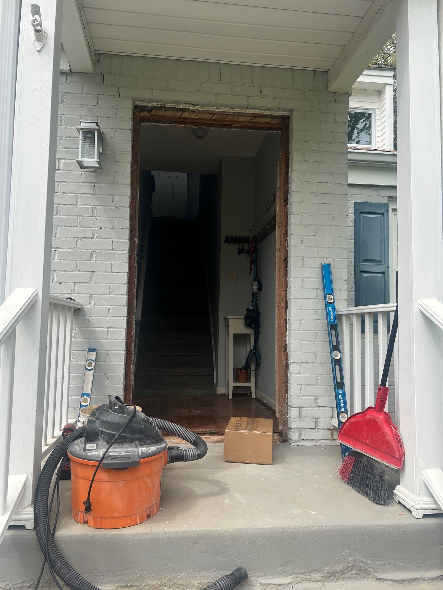 Decatur Exterior Renovation Featuring Painted Brick and Custom Blue Door by Swift Home Renovations