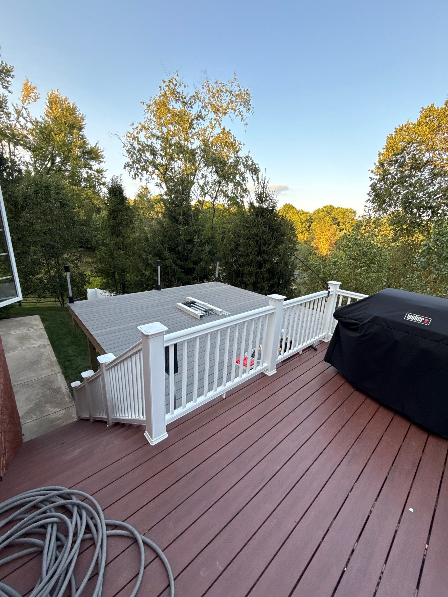 Deck extension  by Cousins Roofing Siding & Decks