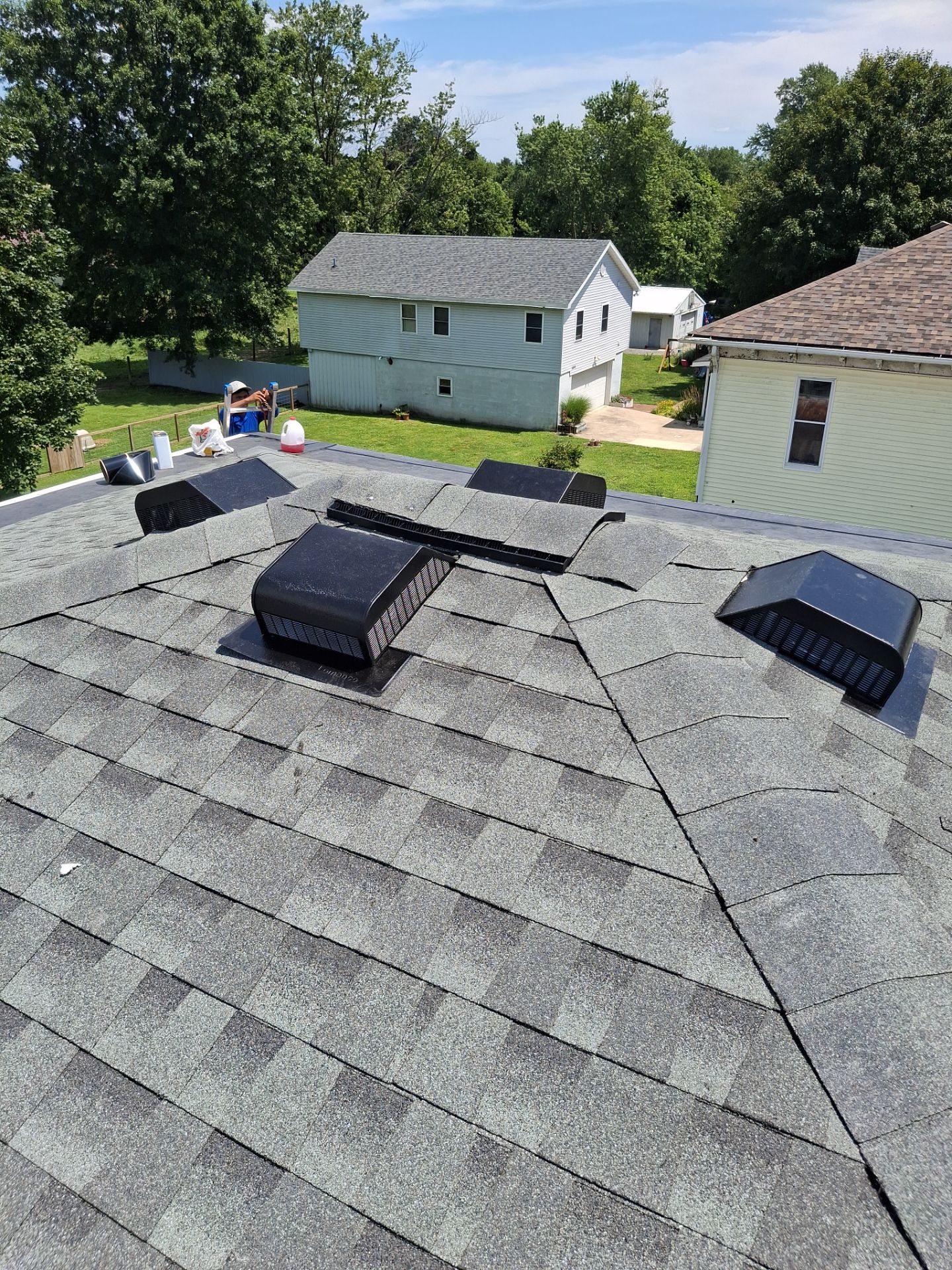 Residential Roofing Installation using GAF Timberline HDZ Williamsburg Slate by Rainstoppers Roofing