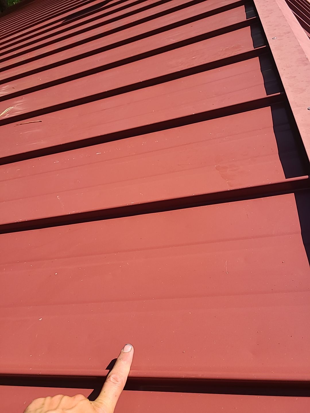 Residential Roofing Installation using Standing Seam Metal by Blue Peaks Roofing LLC 