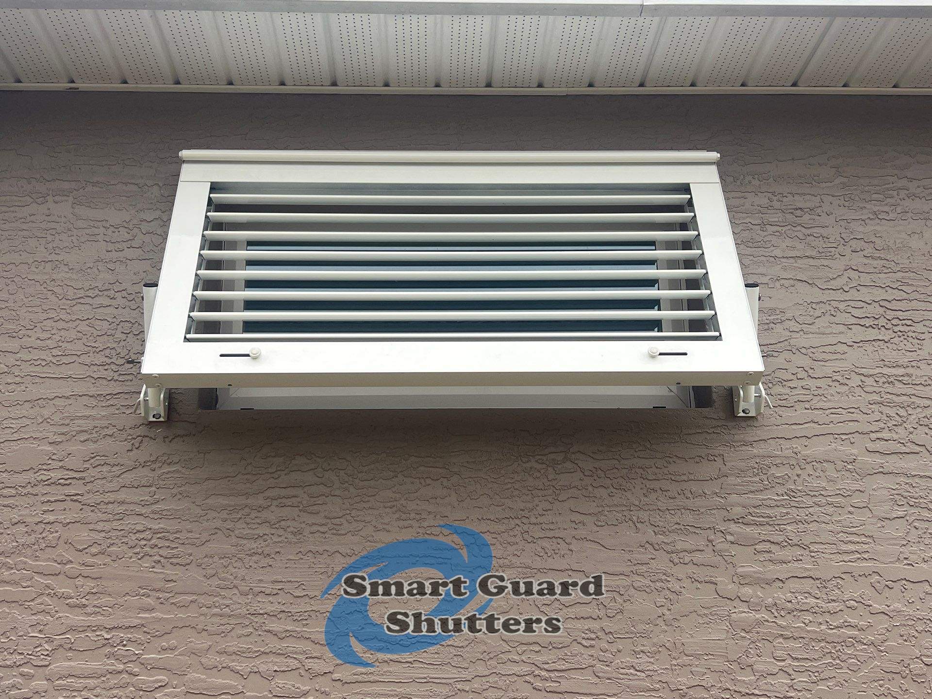 UltraShield Hurricane Screen, Bahamas Shutters in Signal White, Rolling Shutters in White by Smart Guard Shutters