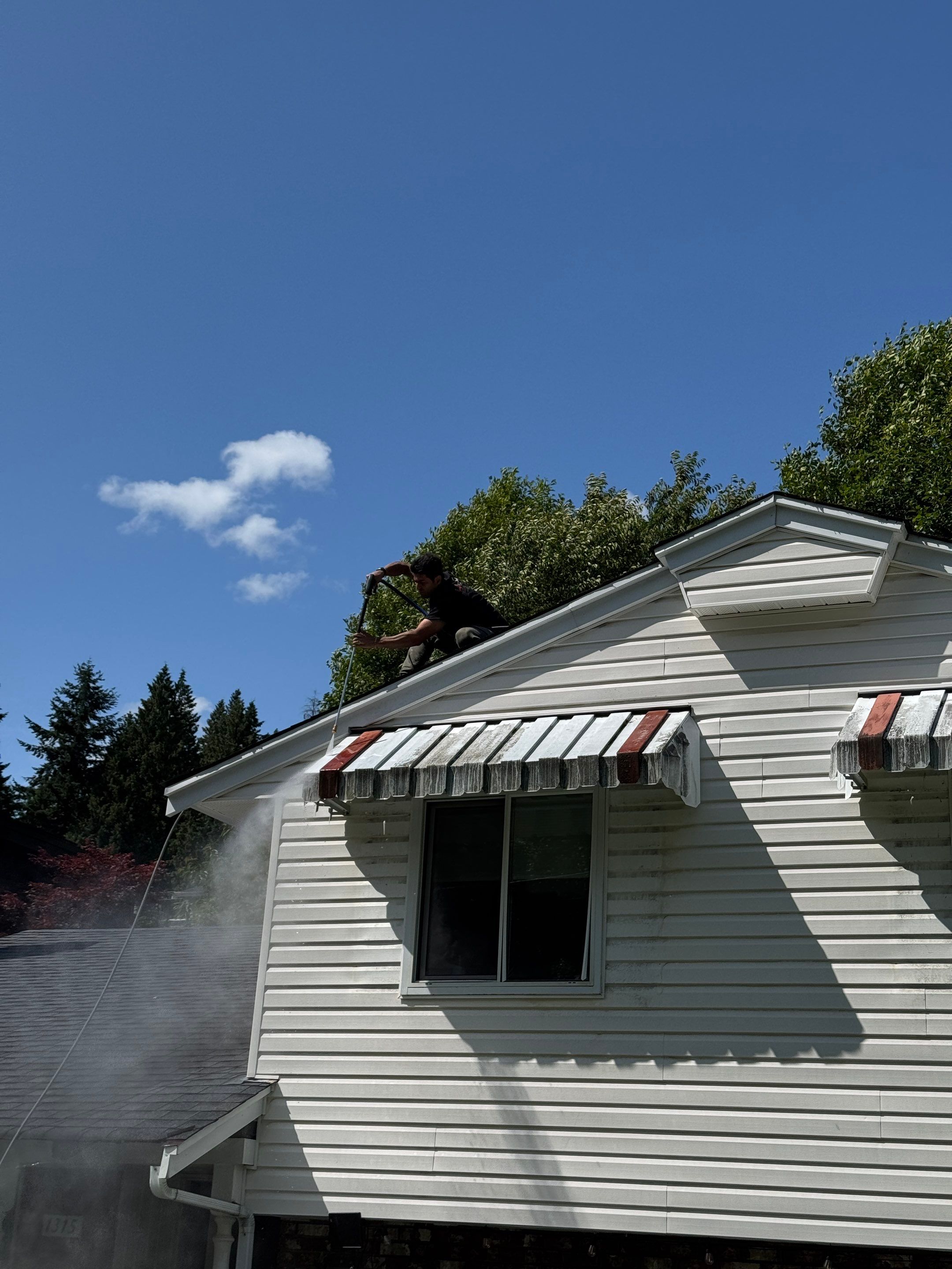Repair Damaged Gutter & Power Wash House Siding by YVR Construction Group