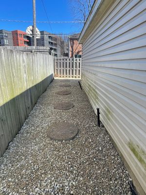 Rock Installation behind garage 