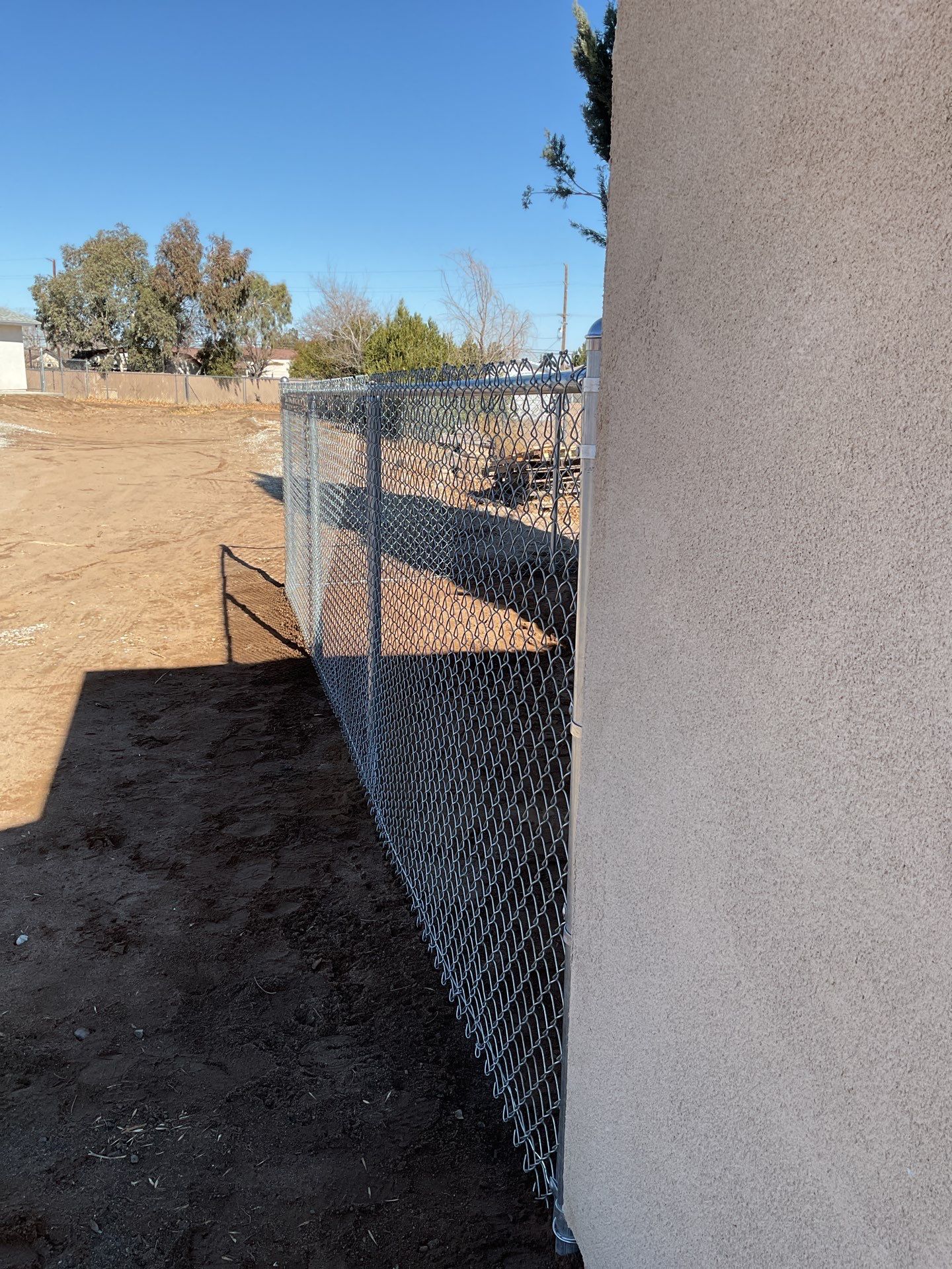 Fence Installation using chain -link by Fence Guys Inc. 