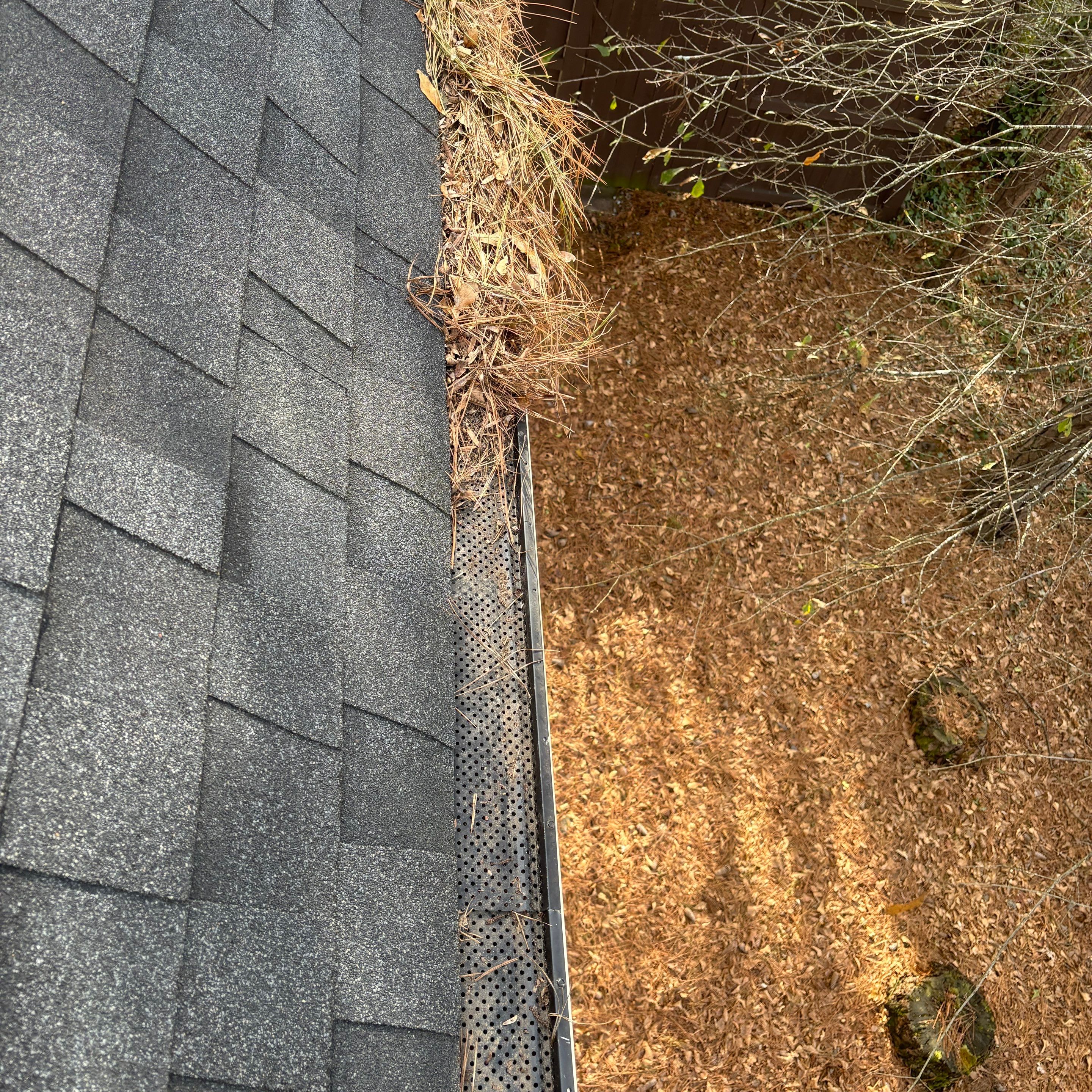 Cleaning Gutters  by Deerfield Roofing LLC