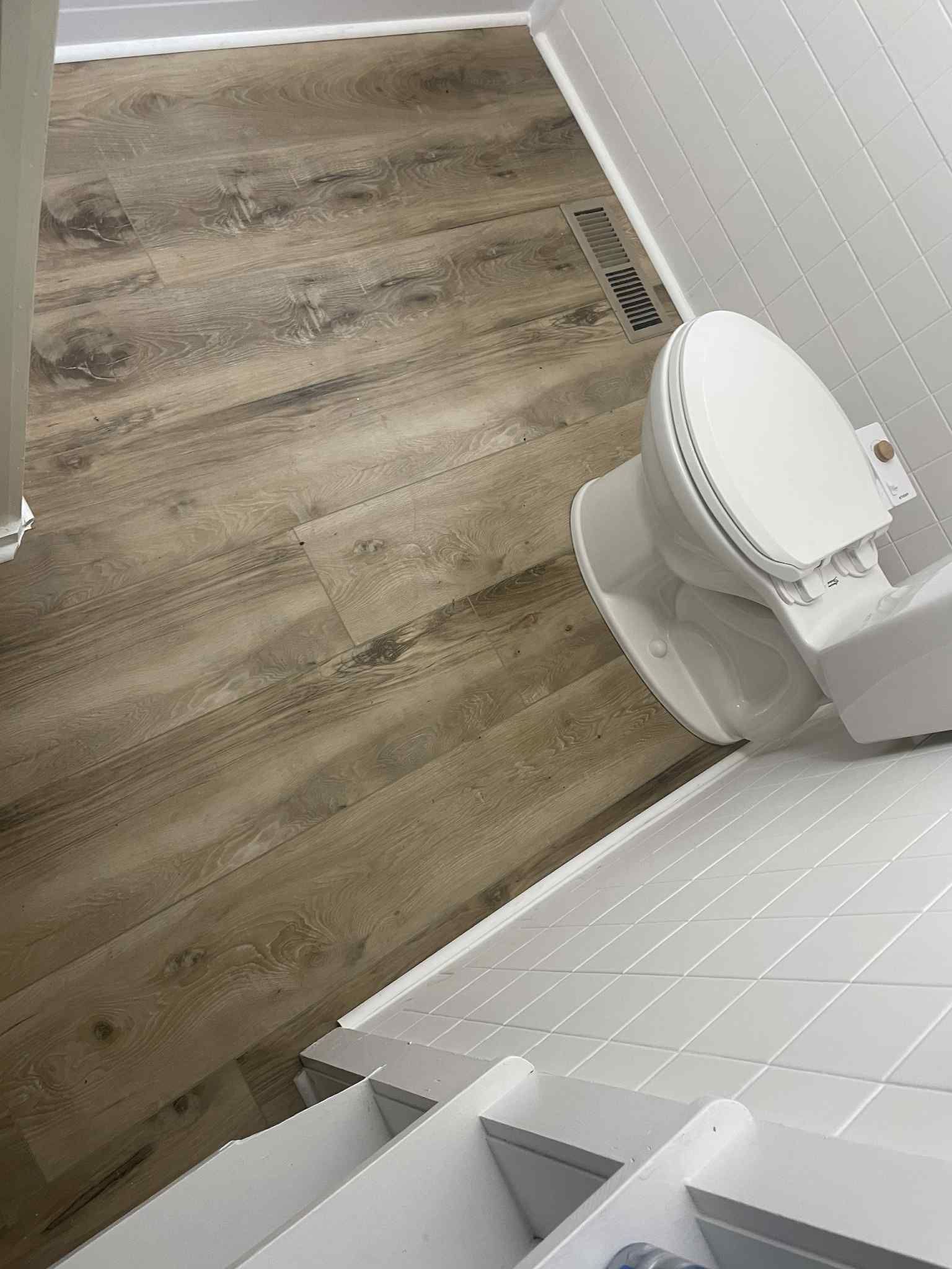 Bathroom Floor Installation by Axtra Hand