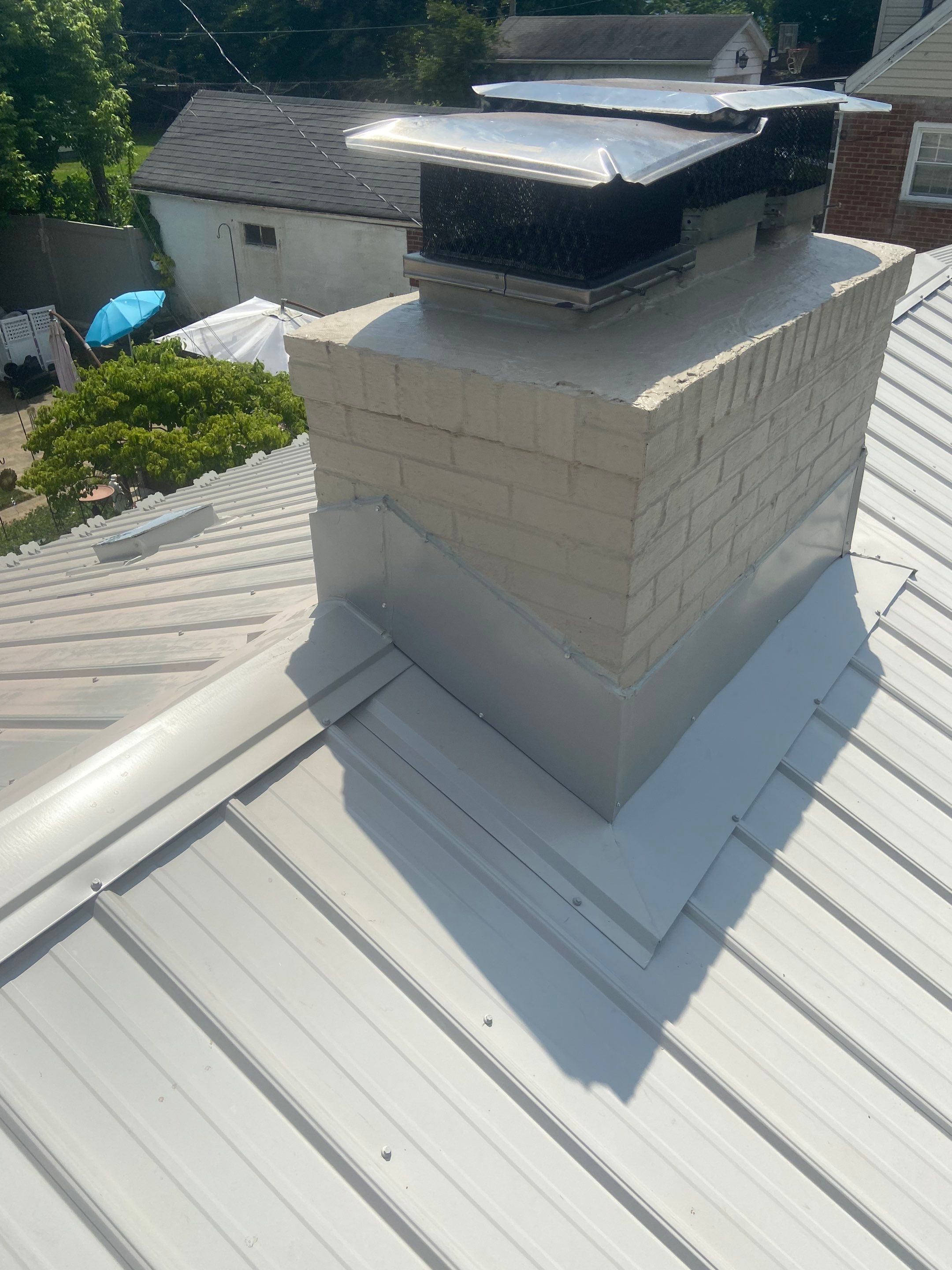 Metal Roofing, Skylights, Porch Build by Secure Construction Company Inc