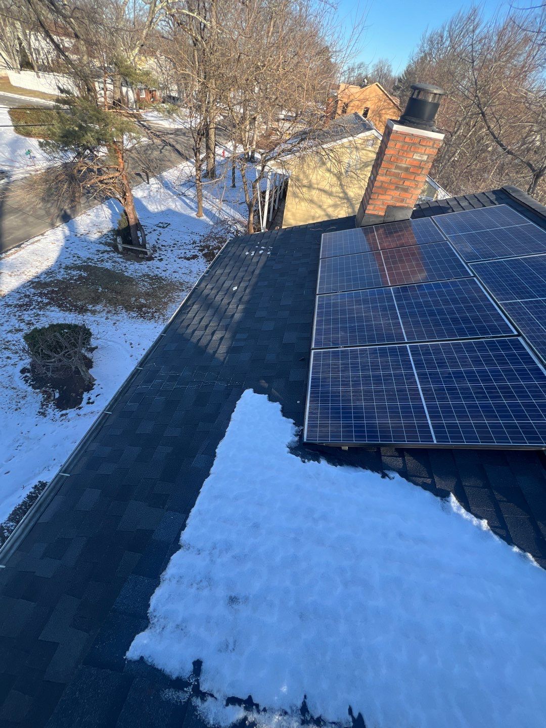 Onyx Black Shingles by Reimagine Roofing