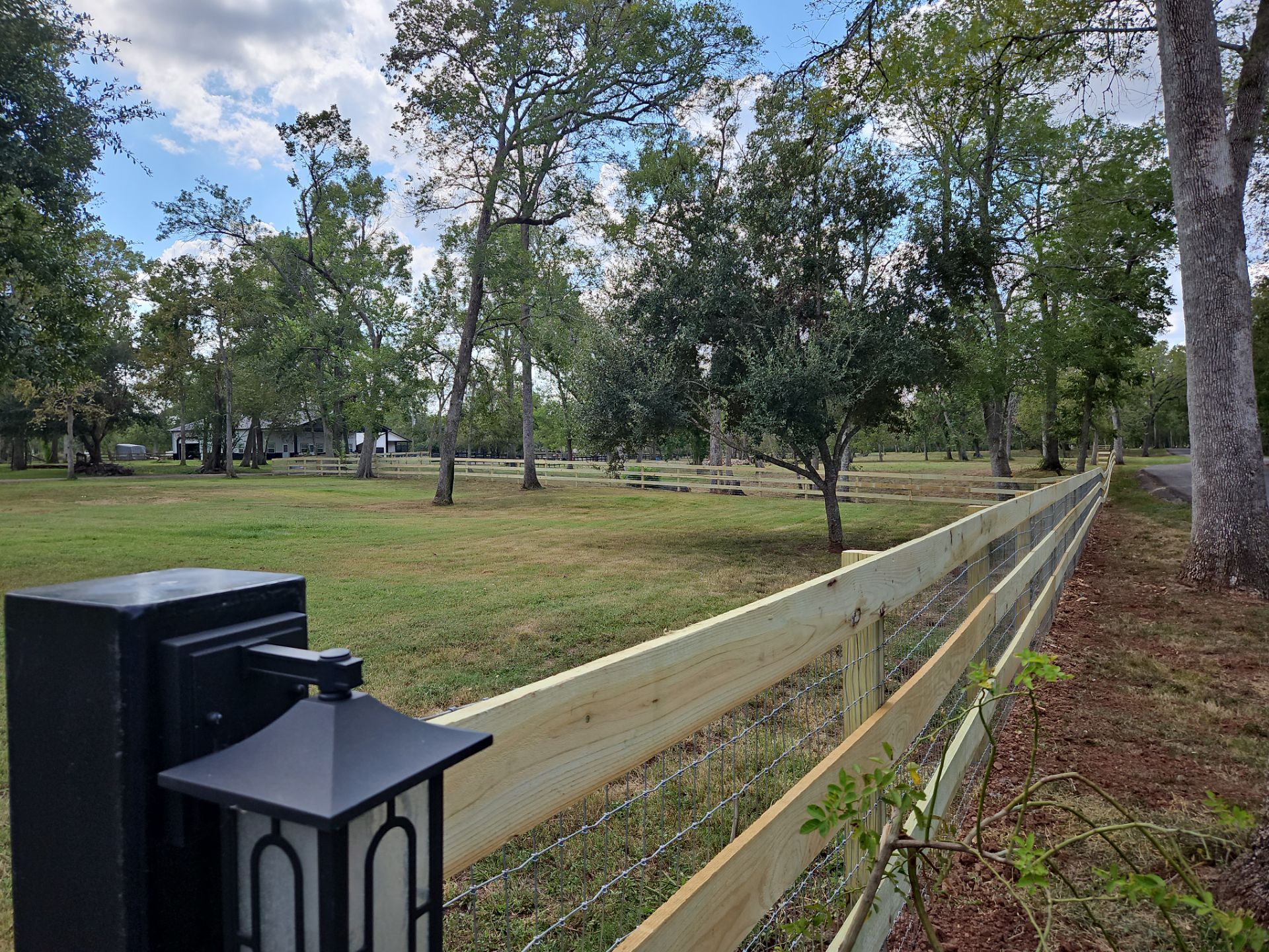 Ranch Style fence Plus Iron installation by Tim's Fences