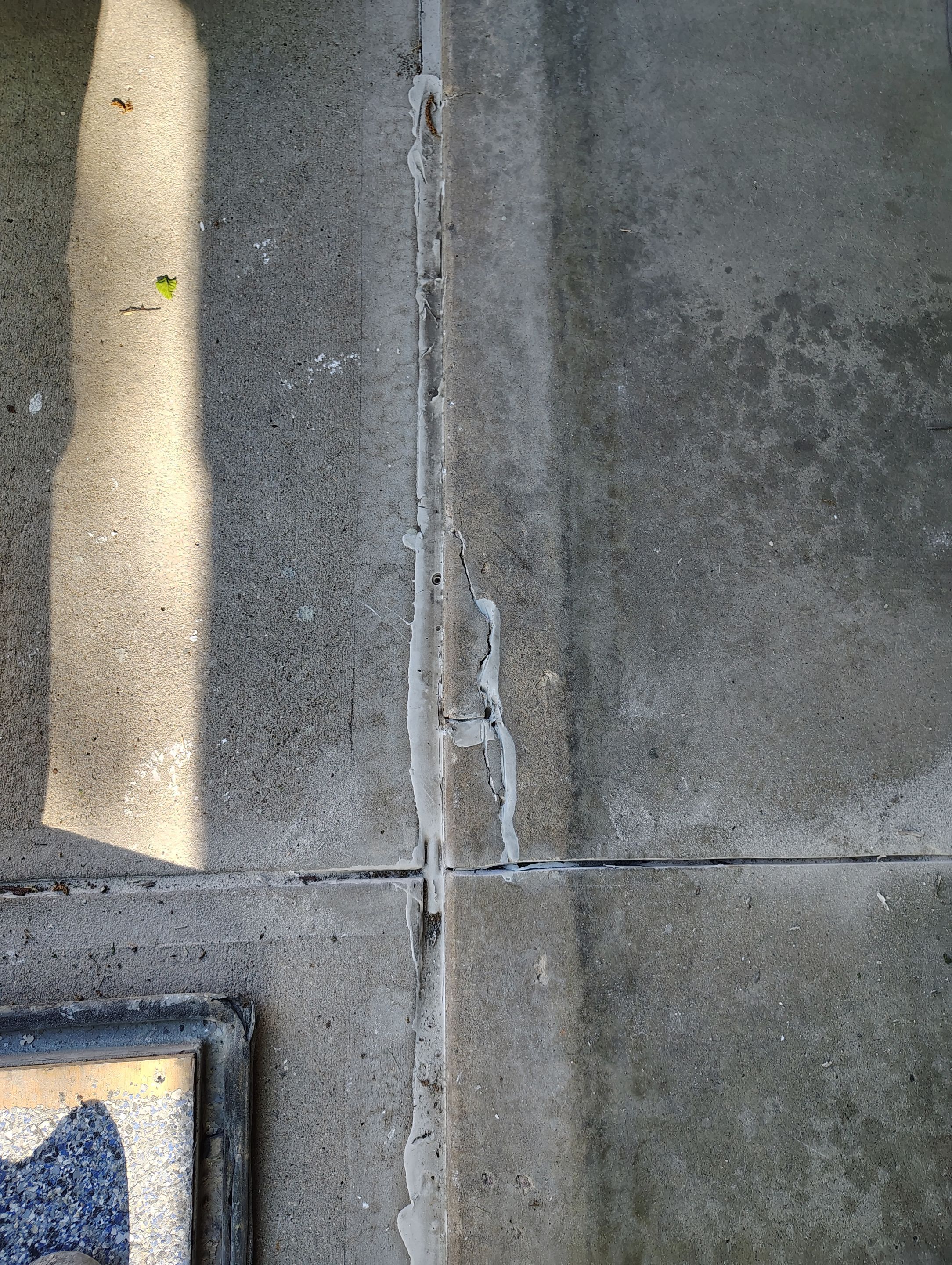 Sioux Falls Garage Concrete Repair and Epoxy Flake Floor Coating by Select Painting, Coatings & Garage Cabinets