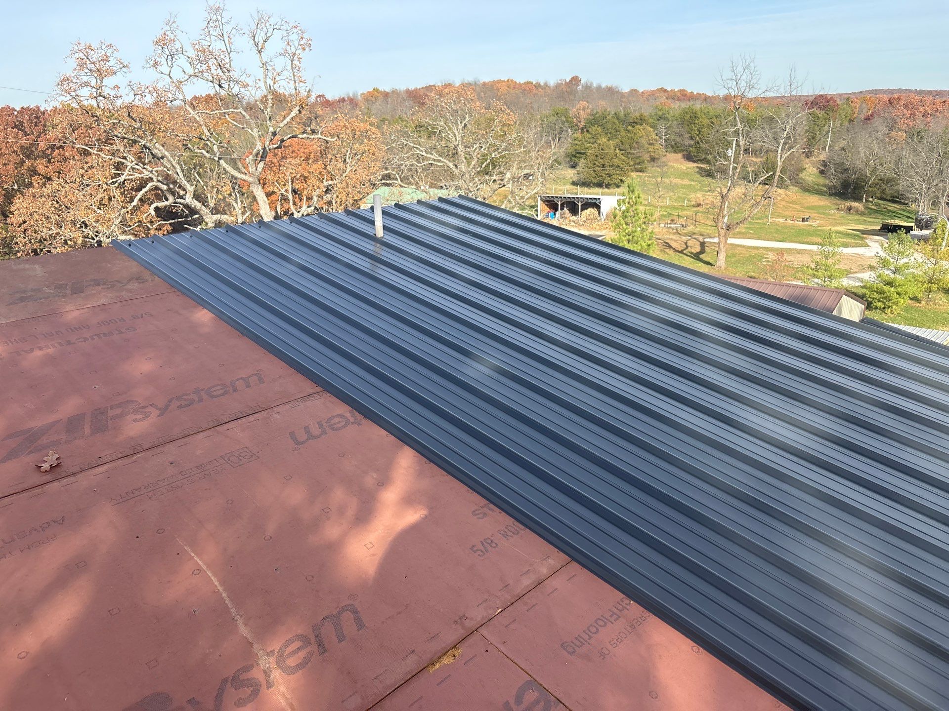 Residential Roofing Install - 29 Gauge G-Rib Metal - Color Black by Titan Commercial & Residential Roofing