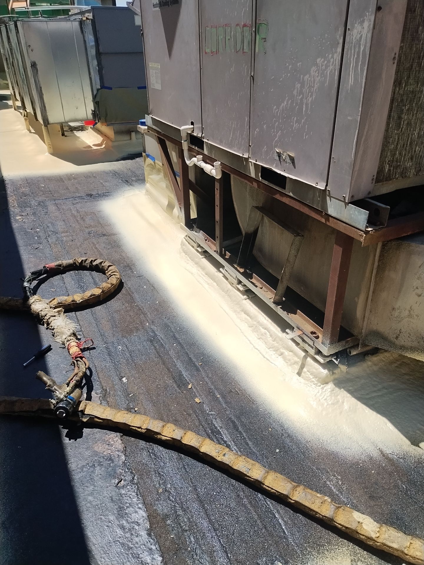 Spray foam and coatings using General Coatings acrylic coatings and spray foam by Straight Edge Roofing Inc