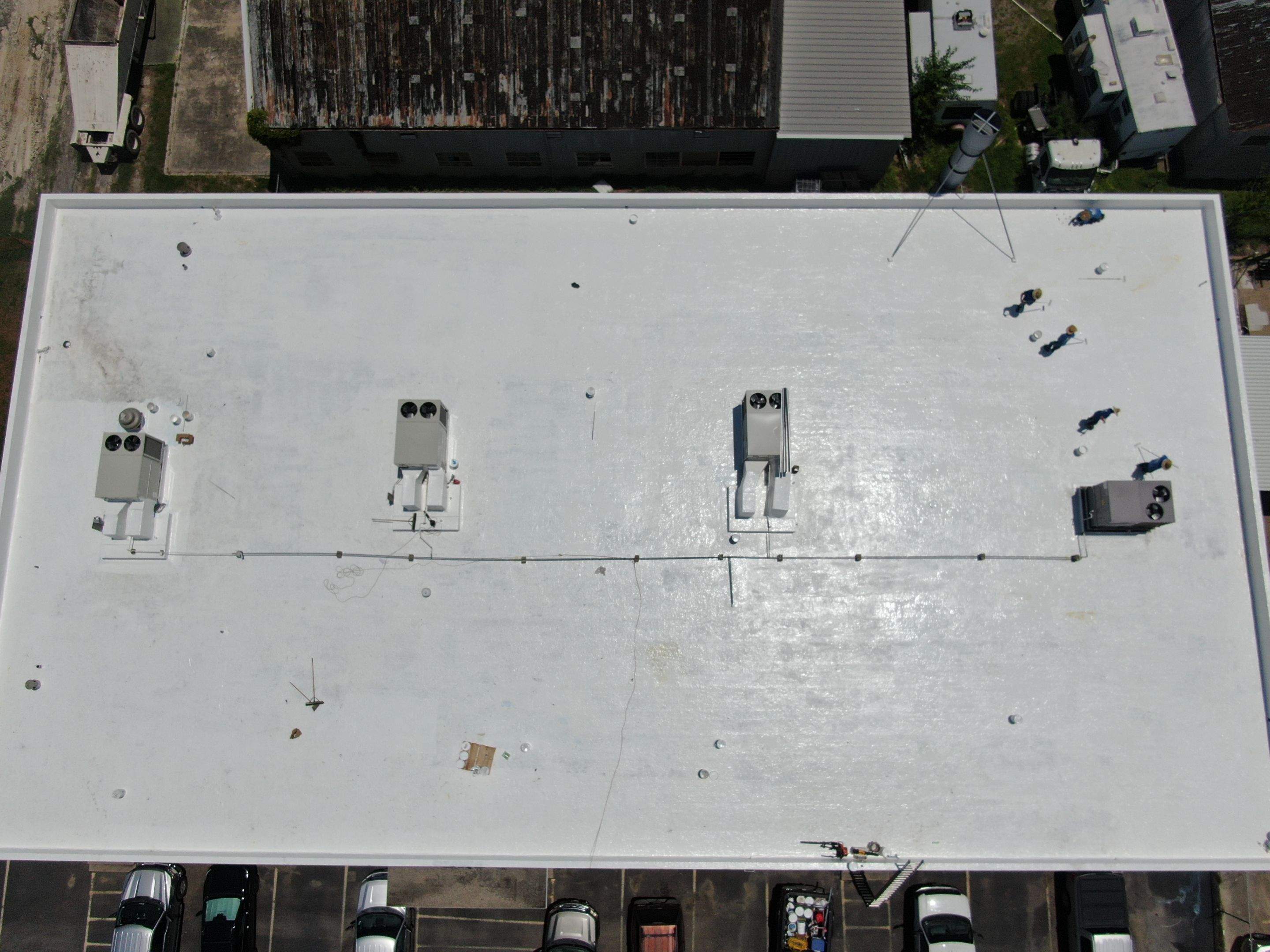 Dirty leaking Gravel Roof by Bayfront Roofing and Construction