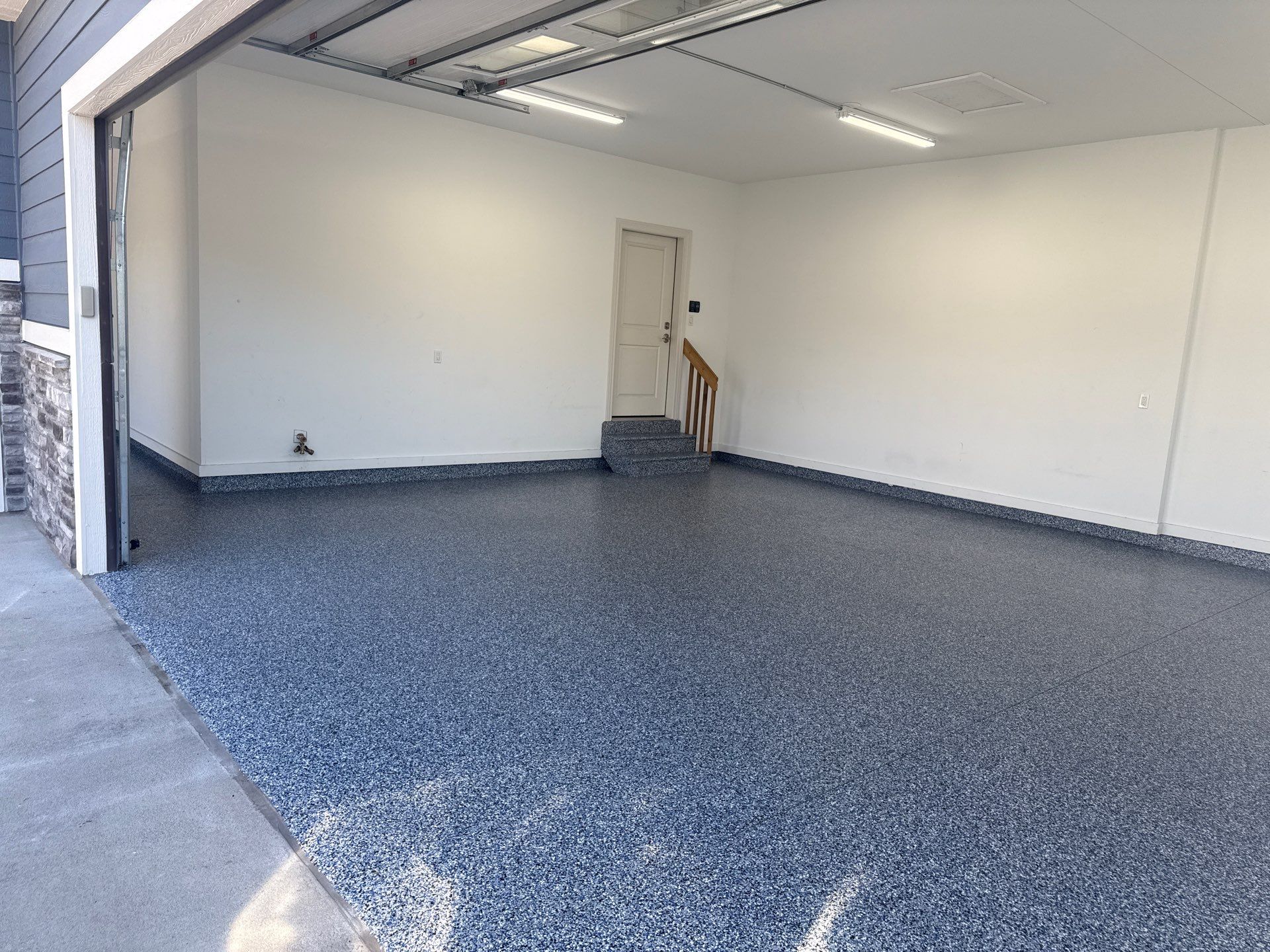 Grimes Garage Floor Coating by Revival Concrete Coatings