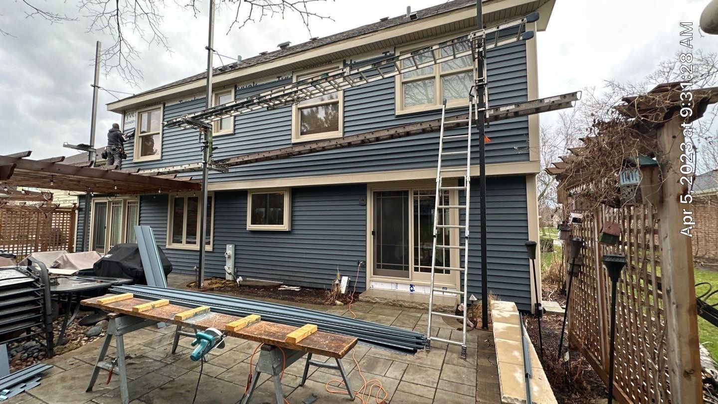 Siding Installation using Alside Charter Oak by Pro Home Services Inc