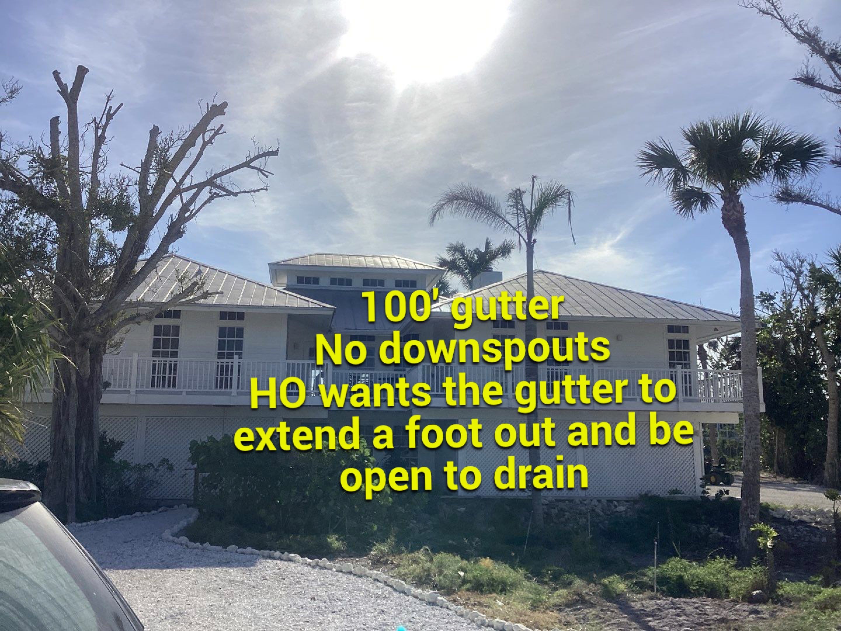 White Gutter Installation in Sanibel FL by Gutter Professors