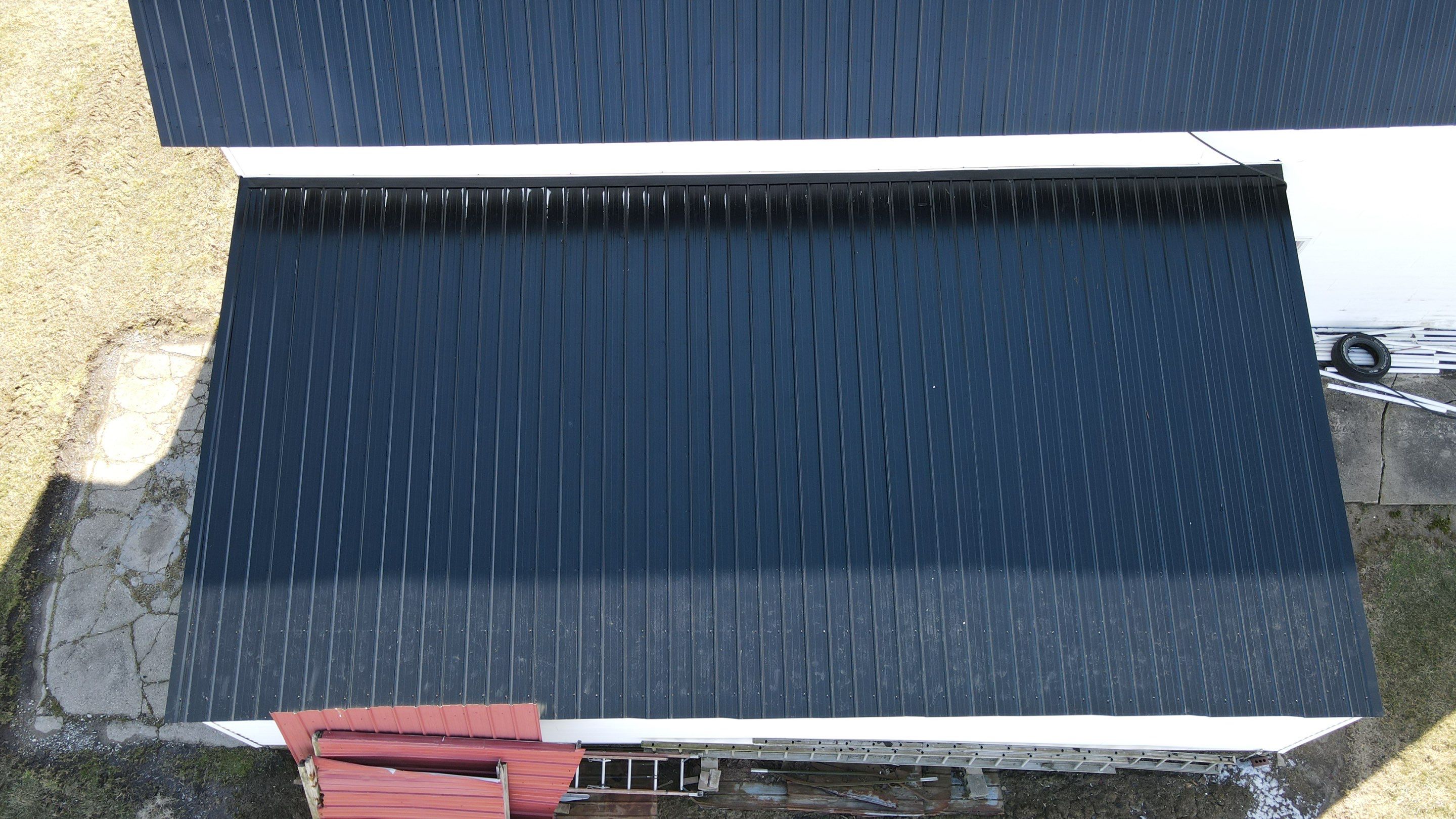 Commercial Roofing Installation using Perfromance Panel Metal - Black by RoofX 