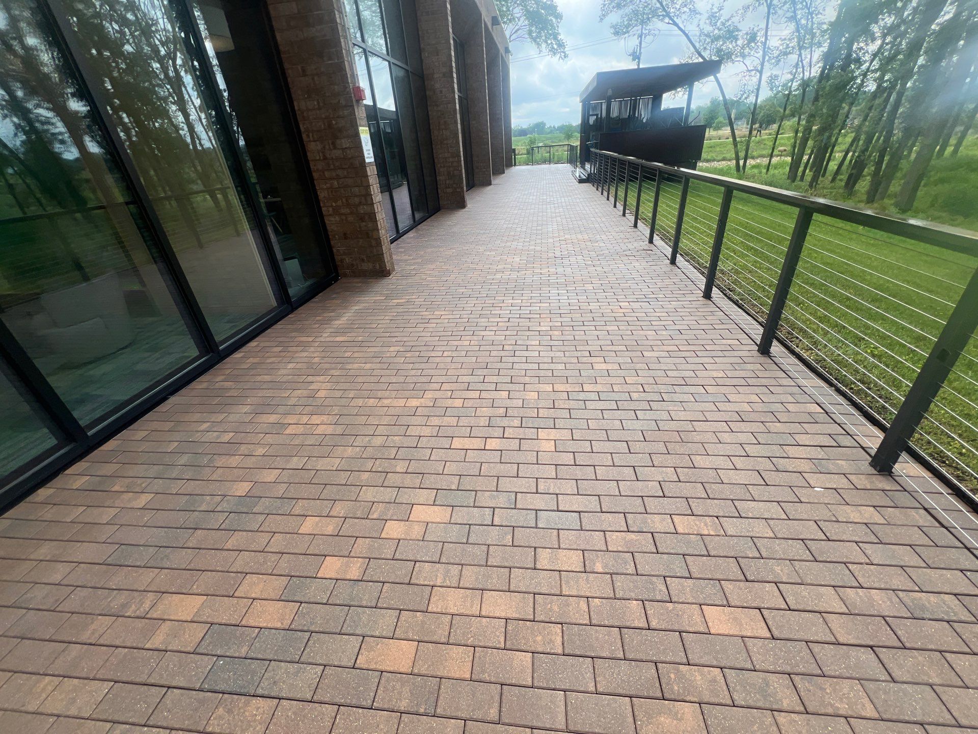 Brick paver repair, cleaning, sealing and poly sanding by Northern Power Washing LLC.