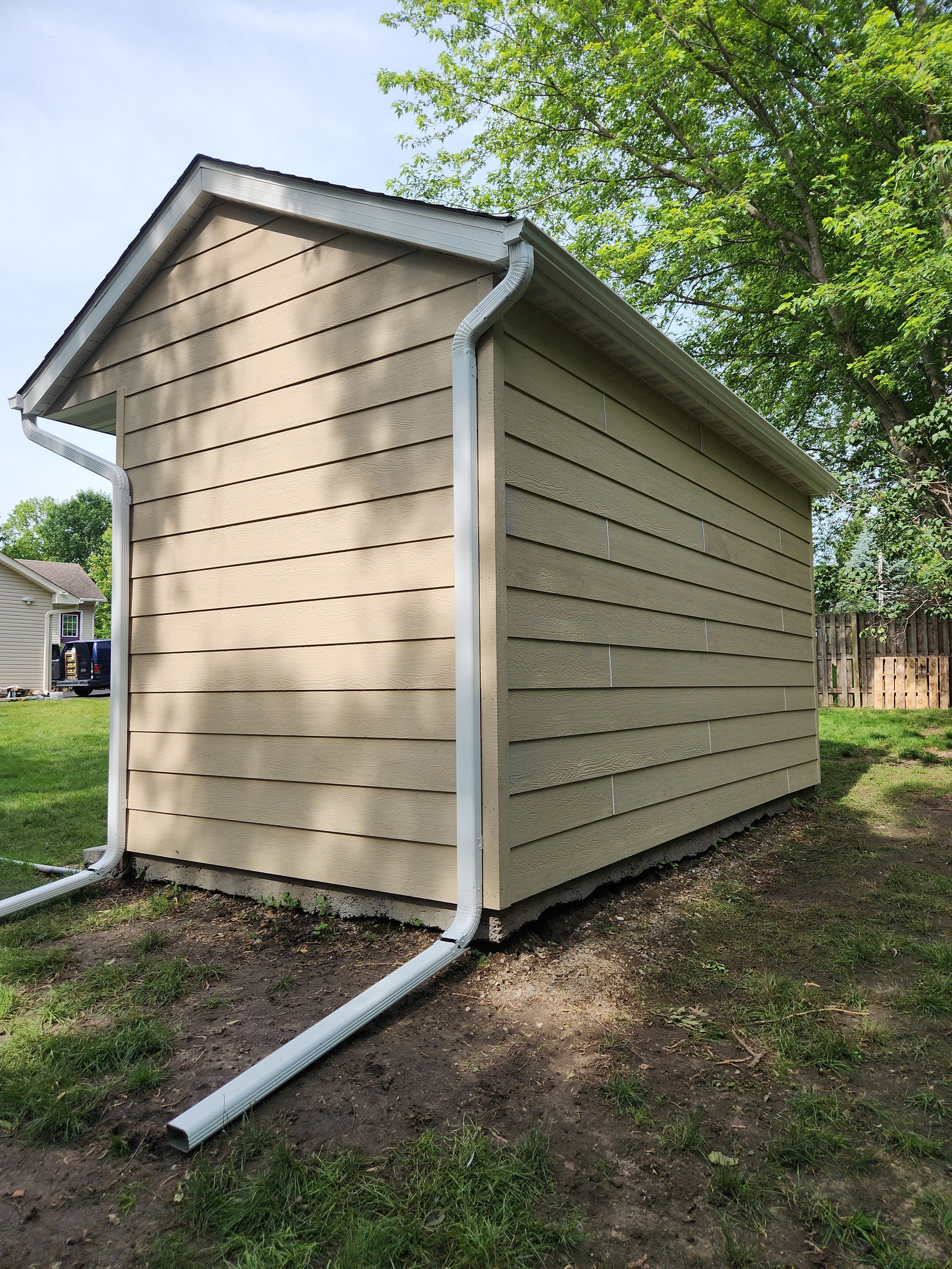 Roofing, Siding & Gutters on Shed Makeover by Next Level Seamless Gutters / Exteriors Inc.