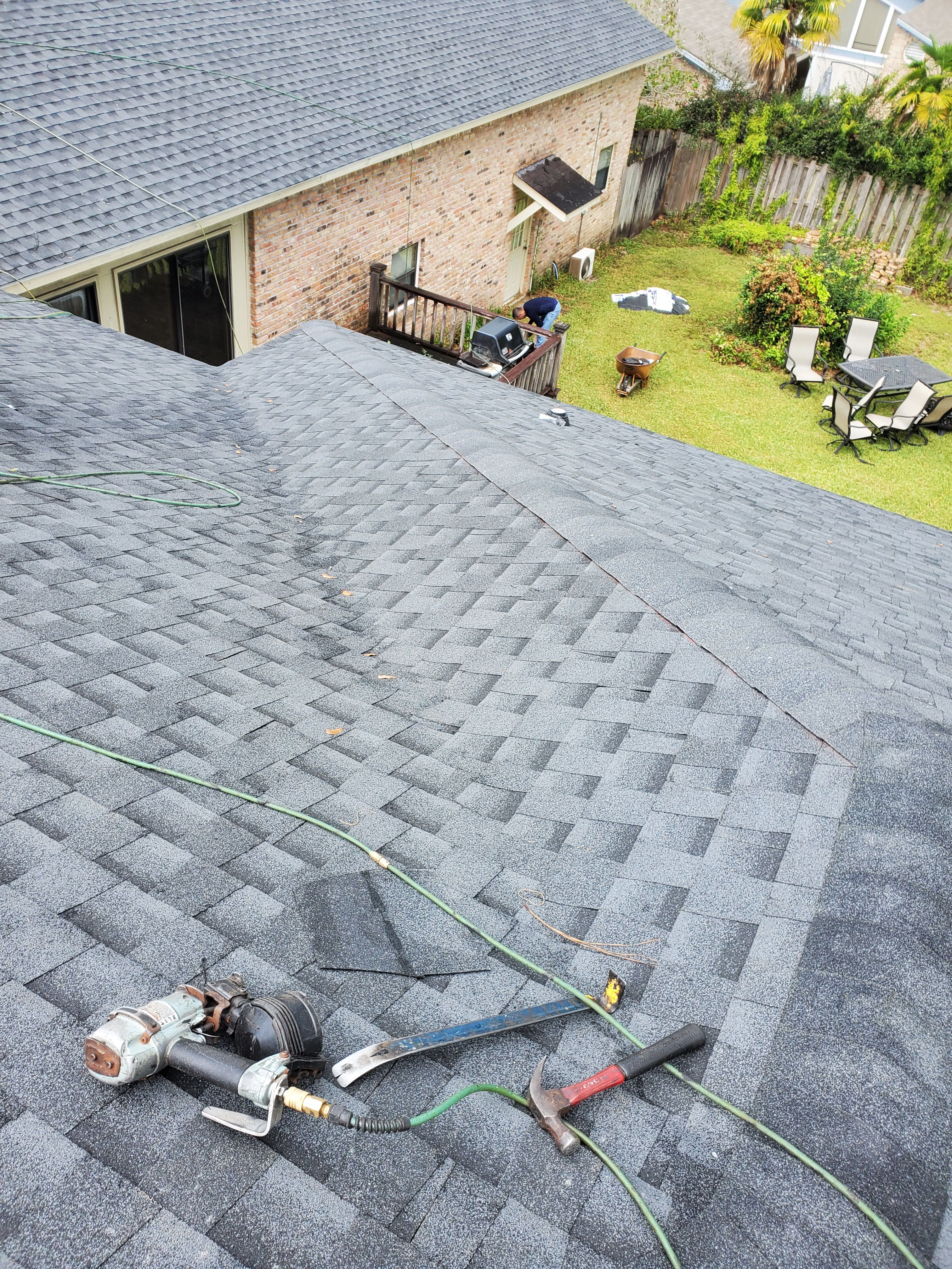 Residential Roofing Installation using Roof Replacement by American Roofing & Construction LLC