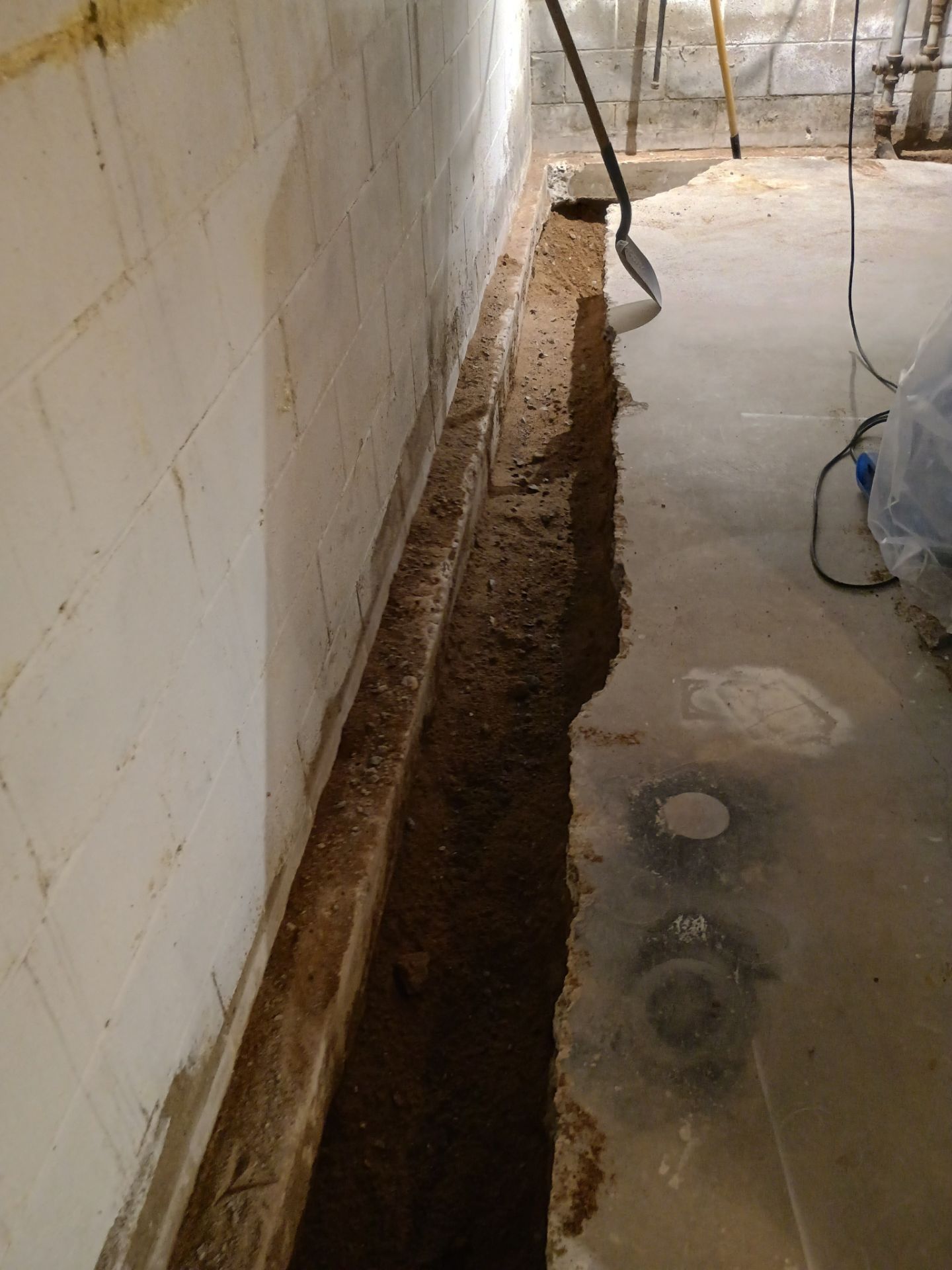 Interior Drain Tile Installation near Columbia Heights, MN by Waterproofing Northeast