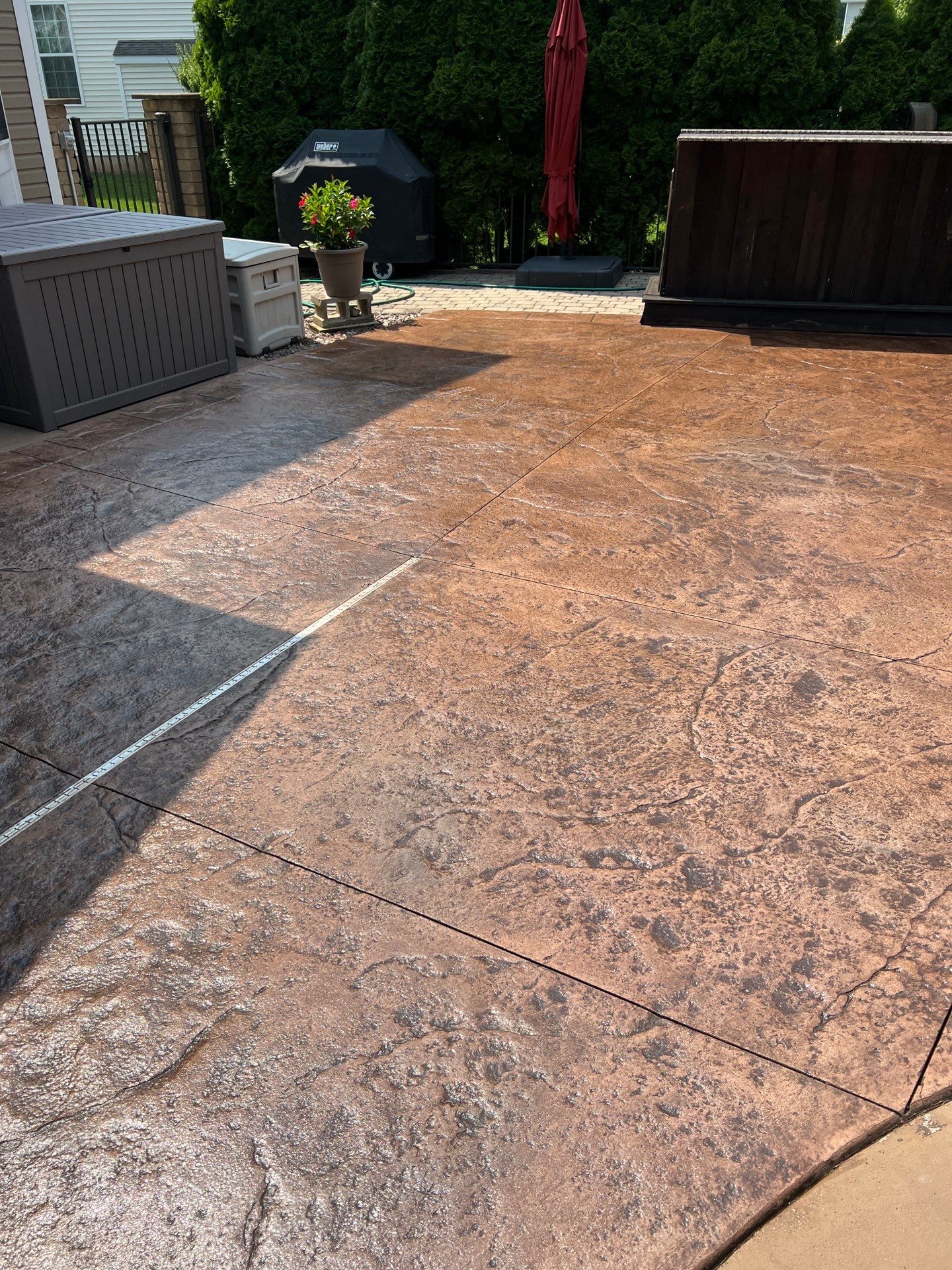 Sidewalk and pool patio Recolor/Reseal  by NG Masonry & Construction LLC