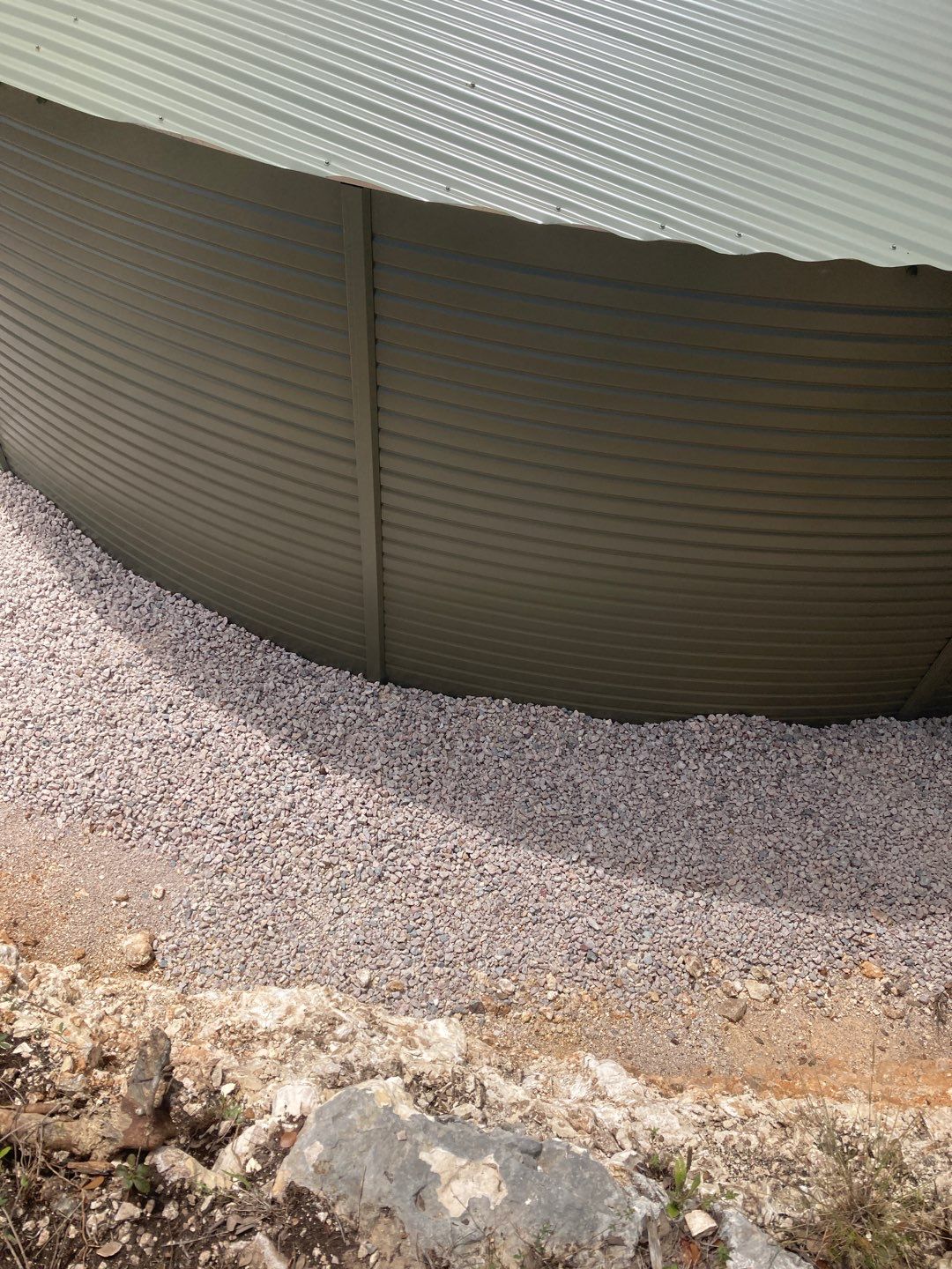 Residential Rainwater Collection System - Pioneer 40K gallon water tank in Mangrove Green by Hill Country Rain Water