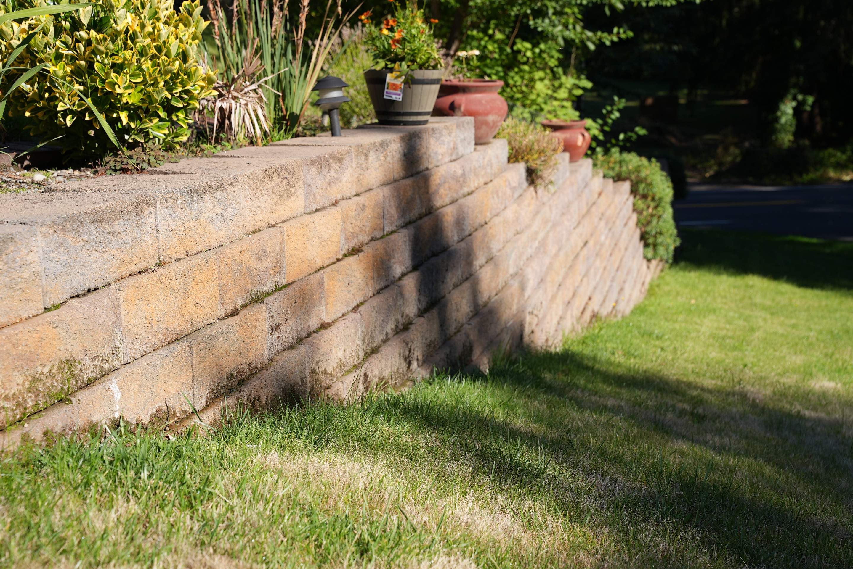 Mehta | Tiled Driveway with Sealer & Retaining Wall  by Jireh Asphalt & Concrete Inc 
