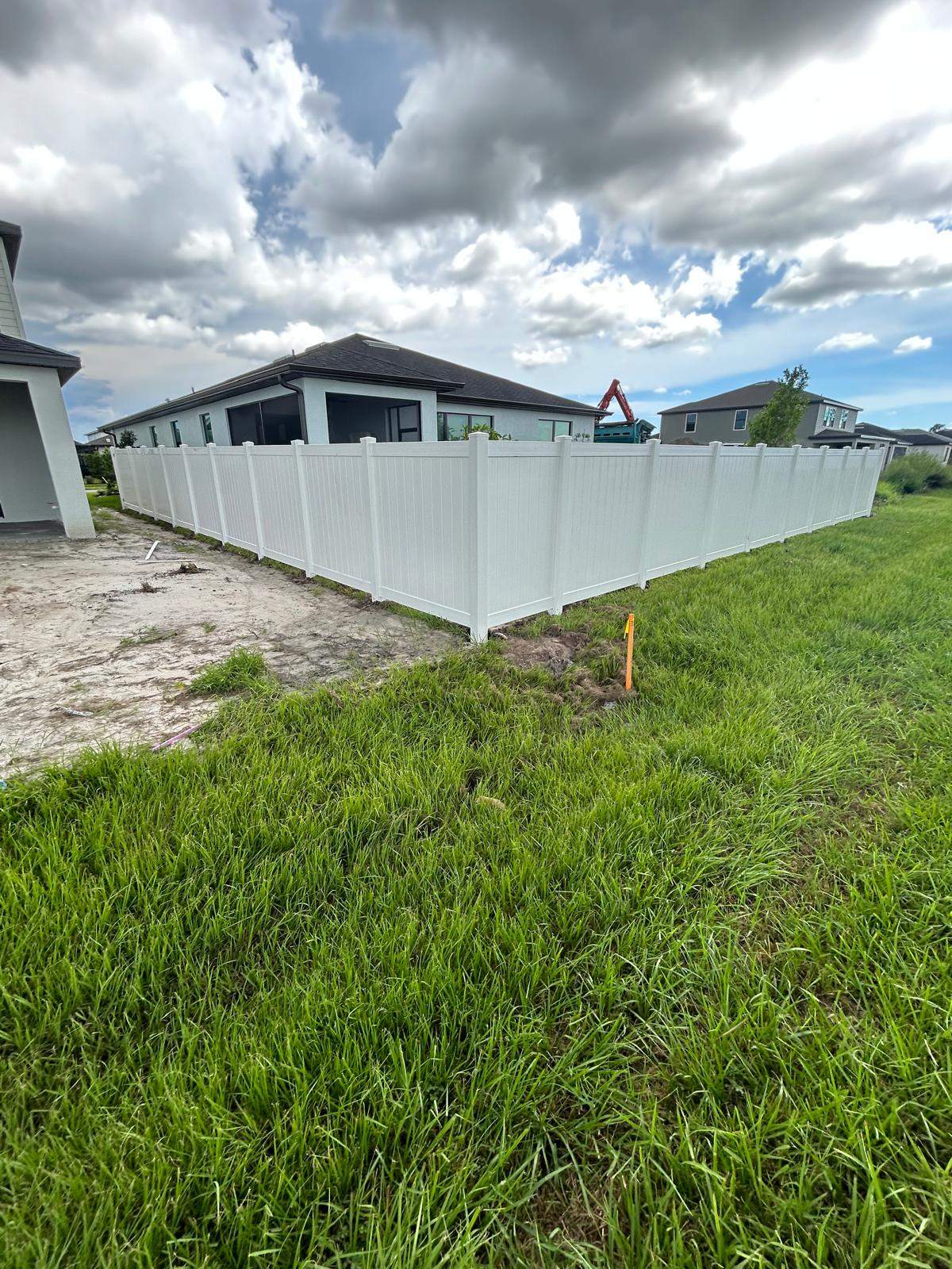 White Vinyl Privacy Fence Installation for North Port Residential Property by True Fence LLC