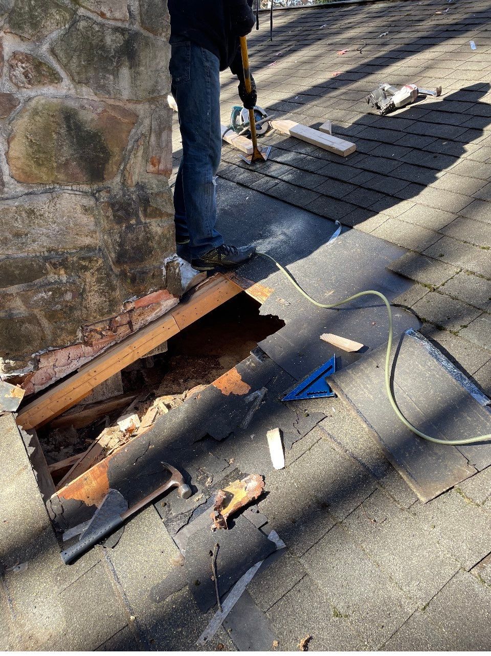 Insurance repair and chimney saddle installation. by Teflon Roofing