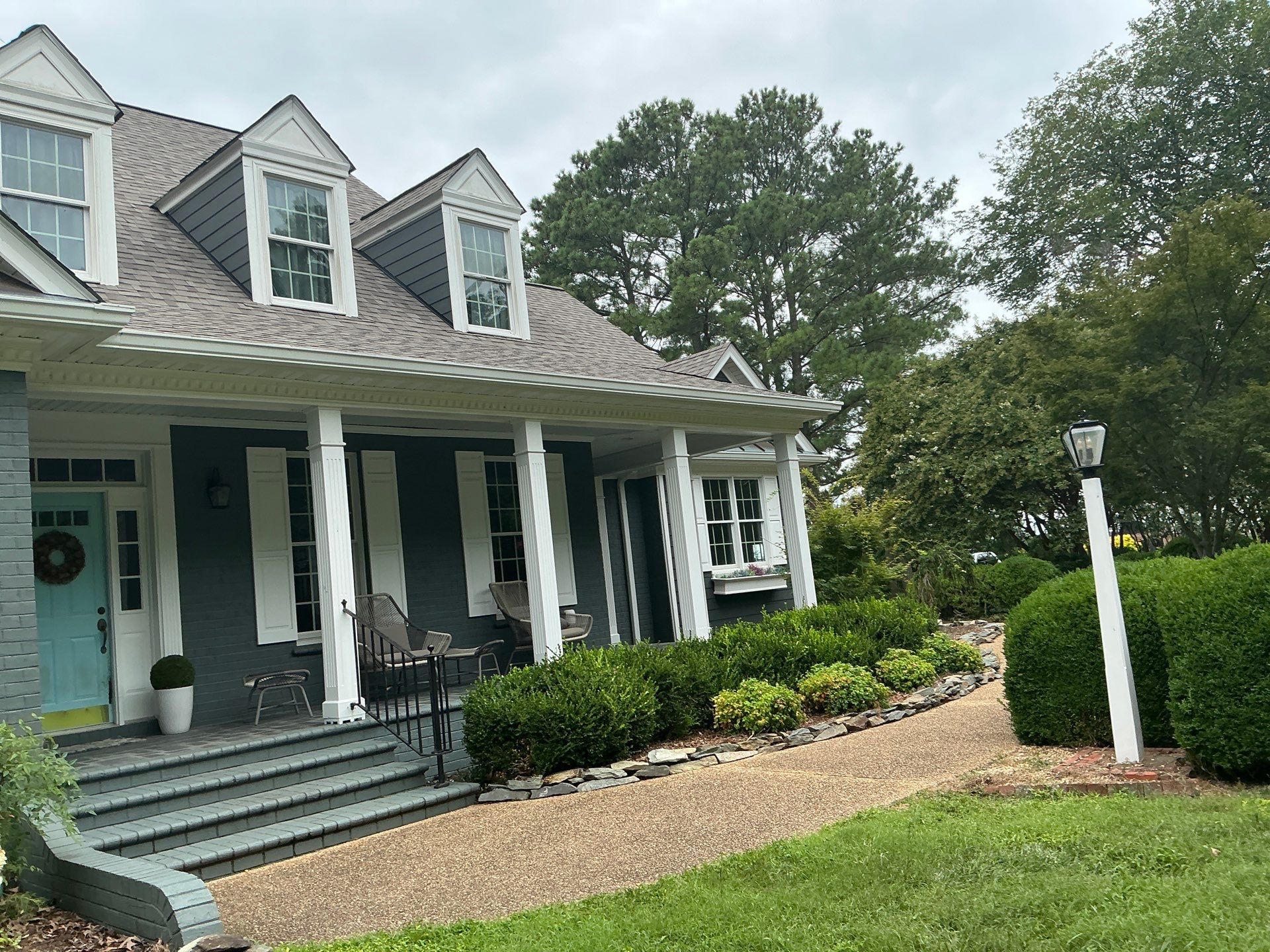 Roof Replacement and White Gutter Installation in Gloucester by Cade Construction