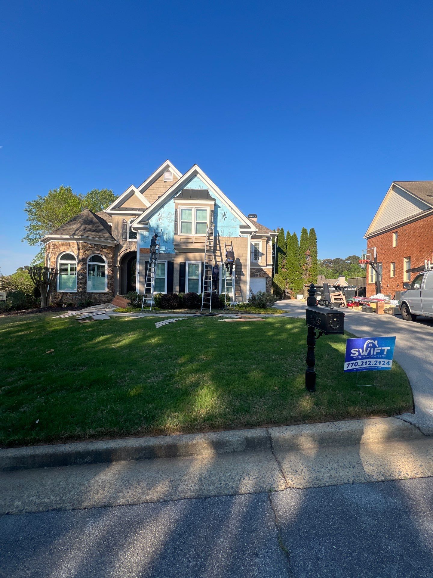 Full Exterior Siding Replacement and Stone Veneer Installation in Roswell by Swift Home Renovations