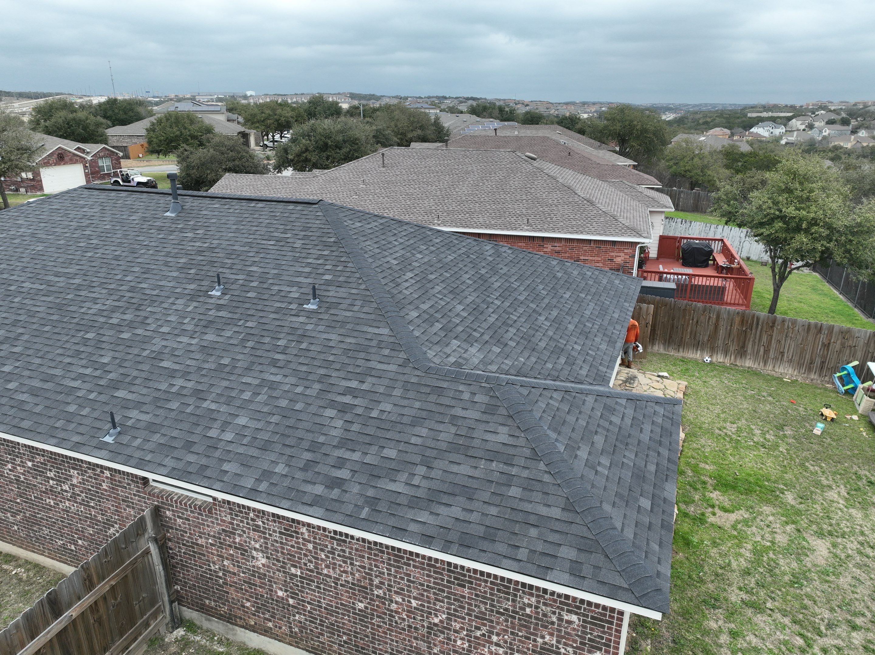 Residential Roof Replacement using 30 Year Laminate Shingles with High Profile Ridge by Premier Roofing and Contracting