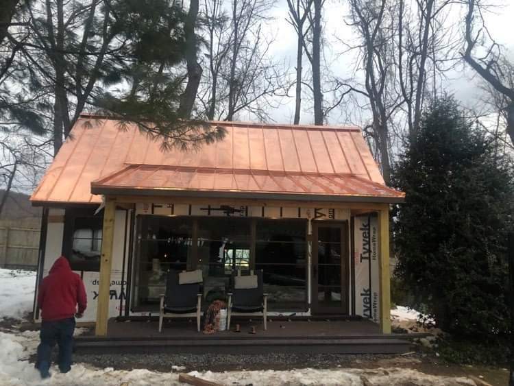 Standing Seam Metal Roof using Copper by CMNG LLC