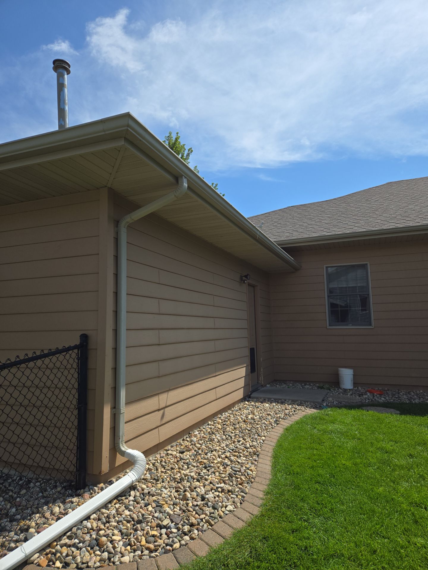 Sioux Falls Residential Exterior Door and Siding Refresh by Select Painting, Coatings & Garage Cabinets