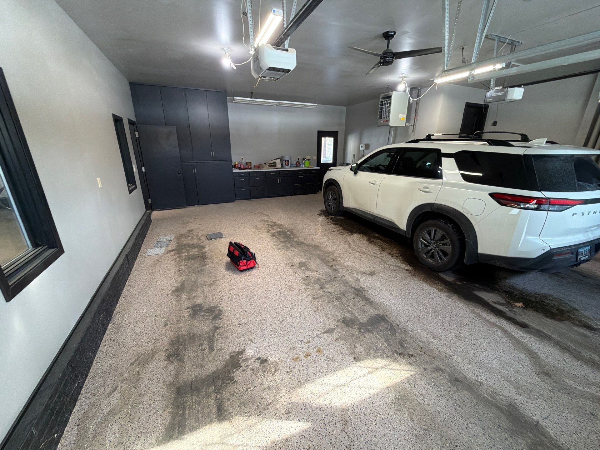 Garage Floor and Textured Pool Deck Coating in Sioux Falls by Select Painting, Coatings & Garage Cabinets