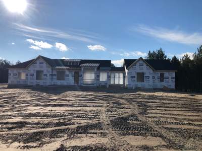 New Home Construction using 16" Standing Seam Panels, & Shingles 
