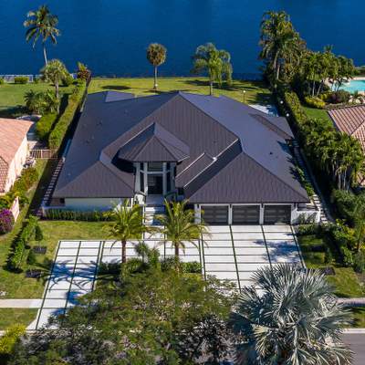 Residential Roofing Installation using 1" Nail strip metal roof