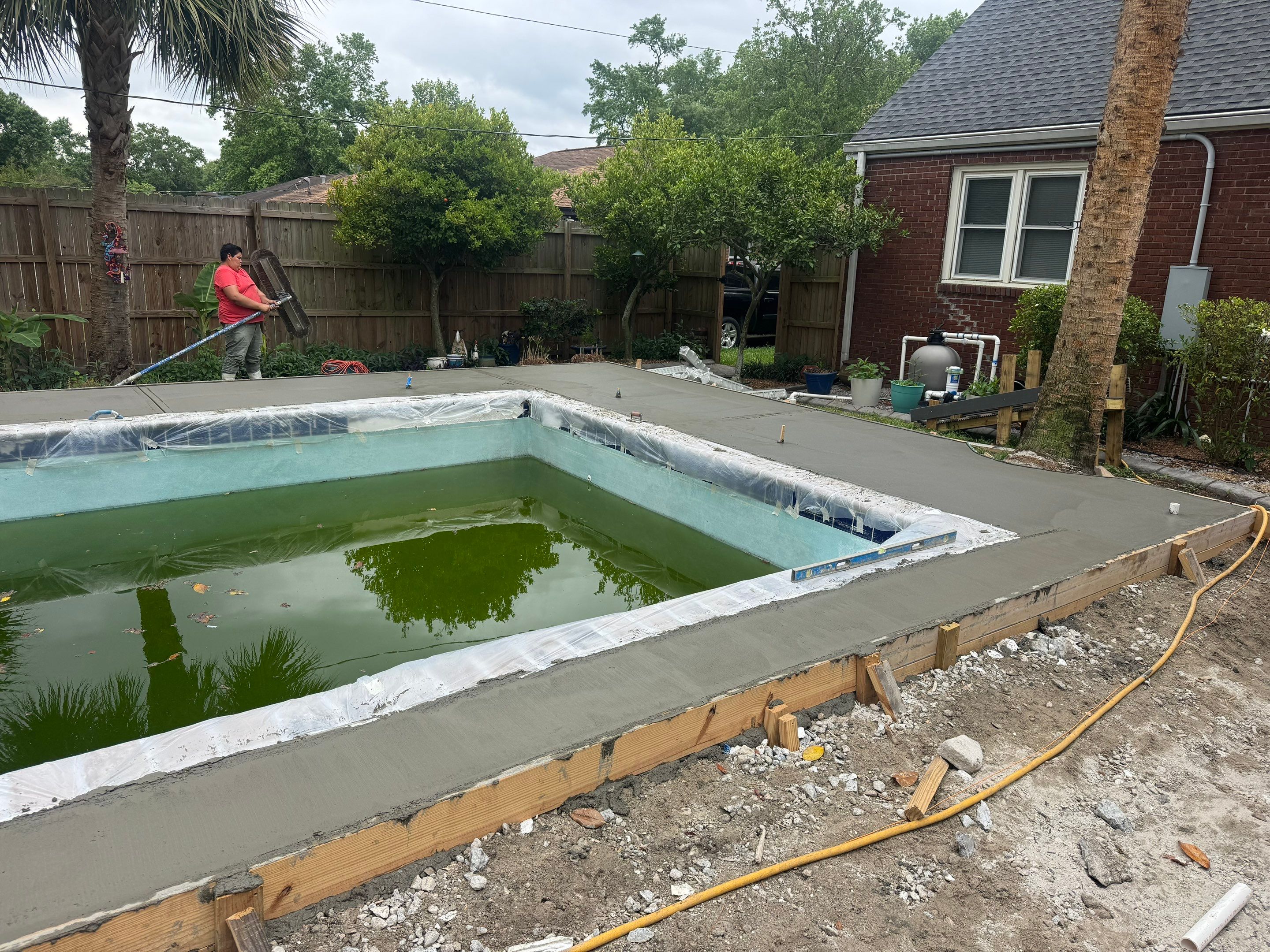 Savannah Pool Deck Replacement with Textured Concrete and Brick Coping by Lowcountry Scapes, LLC