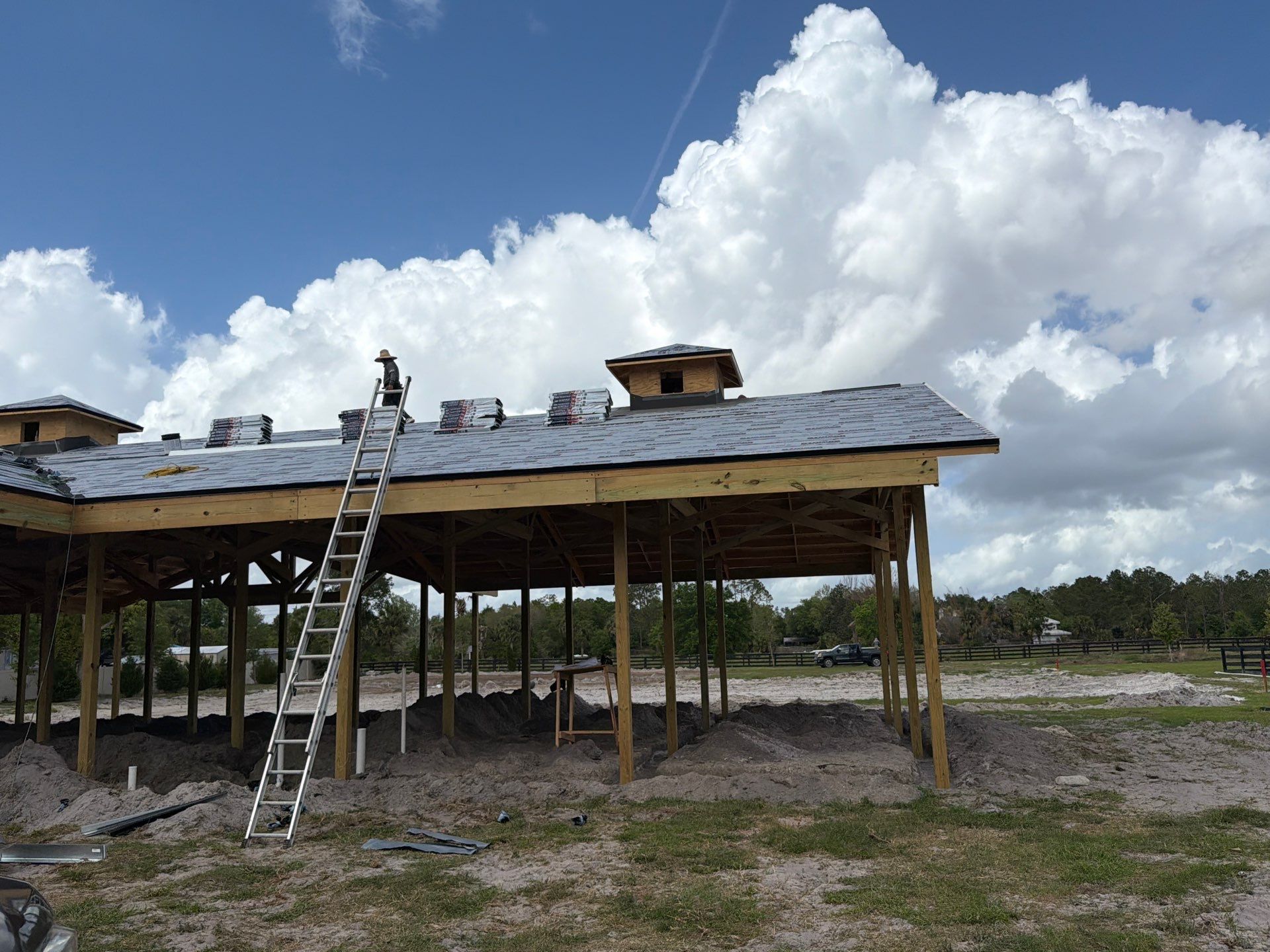 Custom Post-Frame Horse Barn and Shingle Roof Installation in Geneva by Fortified Roofing Solutions Corp.