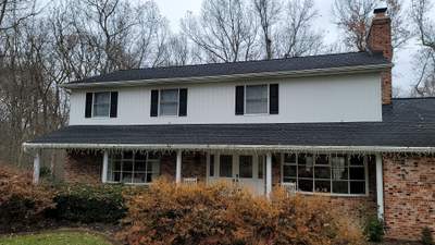 White Board & Batten Siding with Black Trim