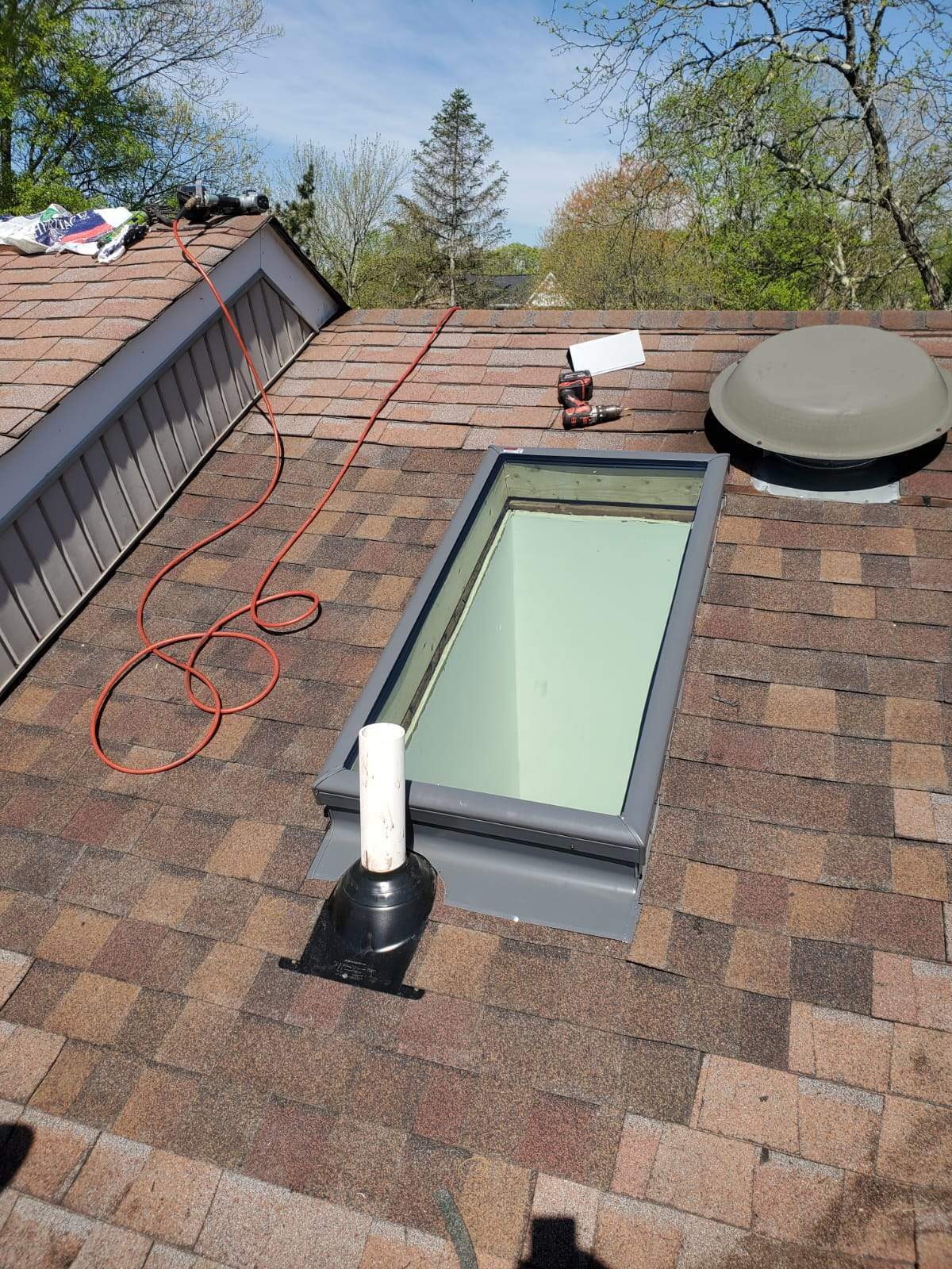 Skylight using Velux Fixed Curb Mounted Skylight by ExteriorPros
