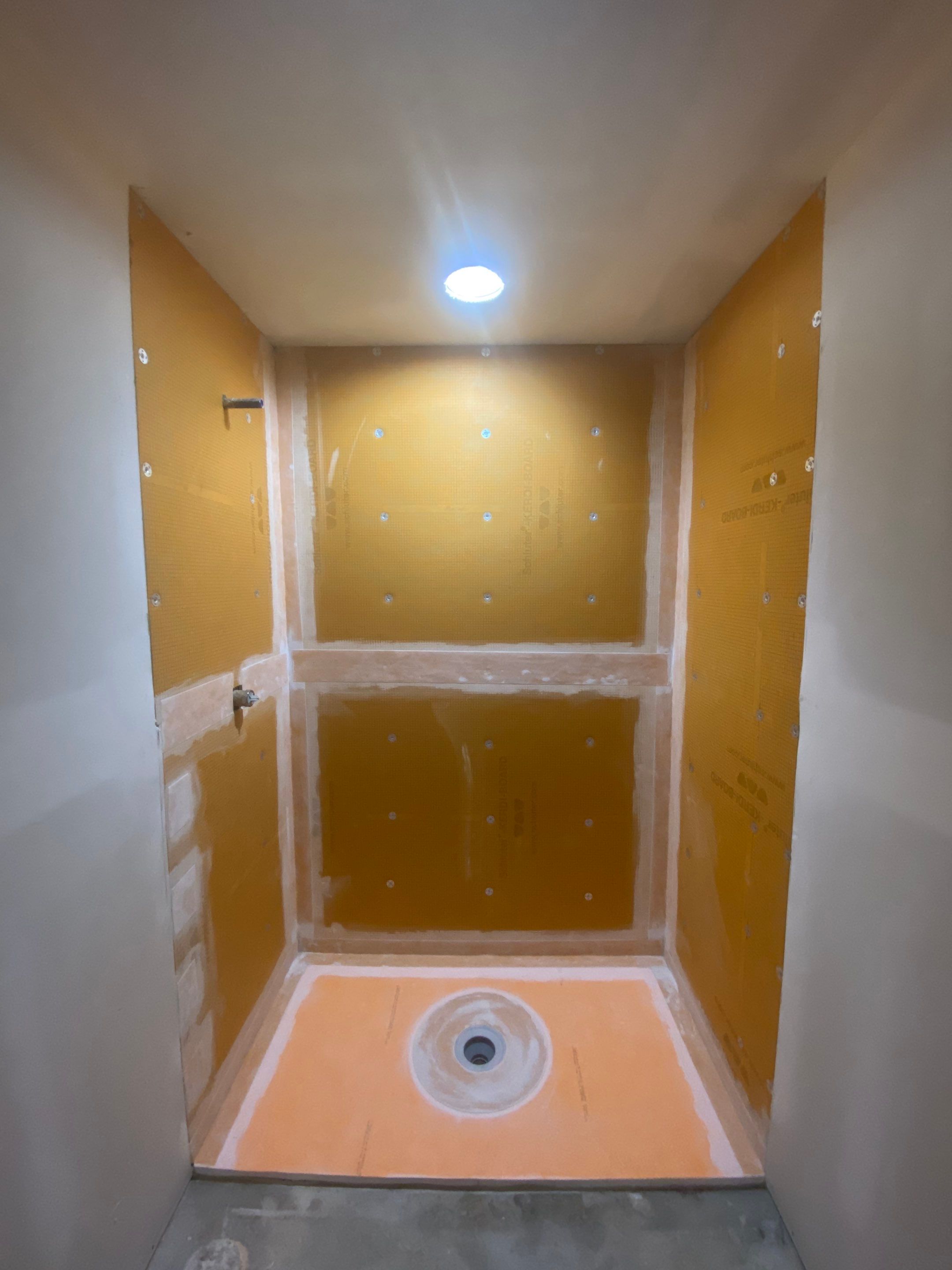 Marietta Basement Remodeling Featuring Custom Wet Bar and Marble Shower by Swift Home Renovations