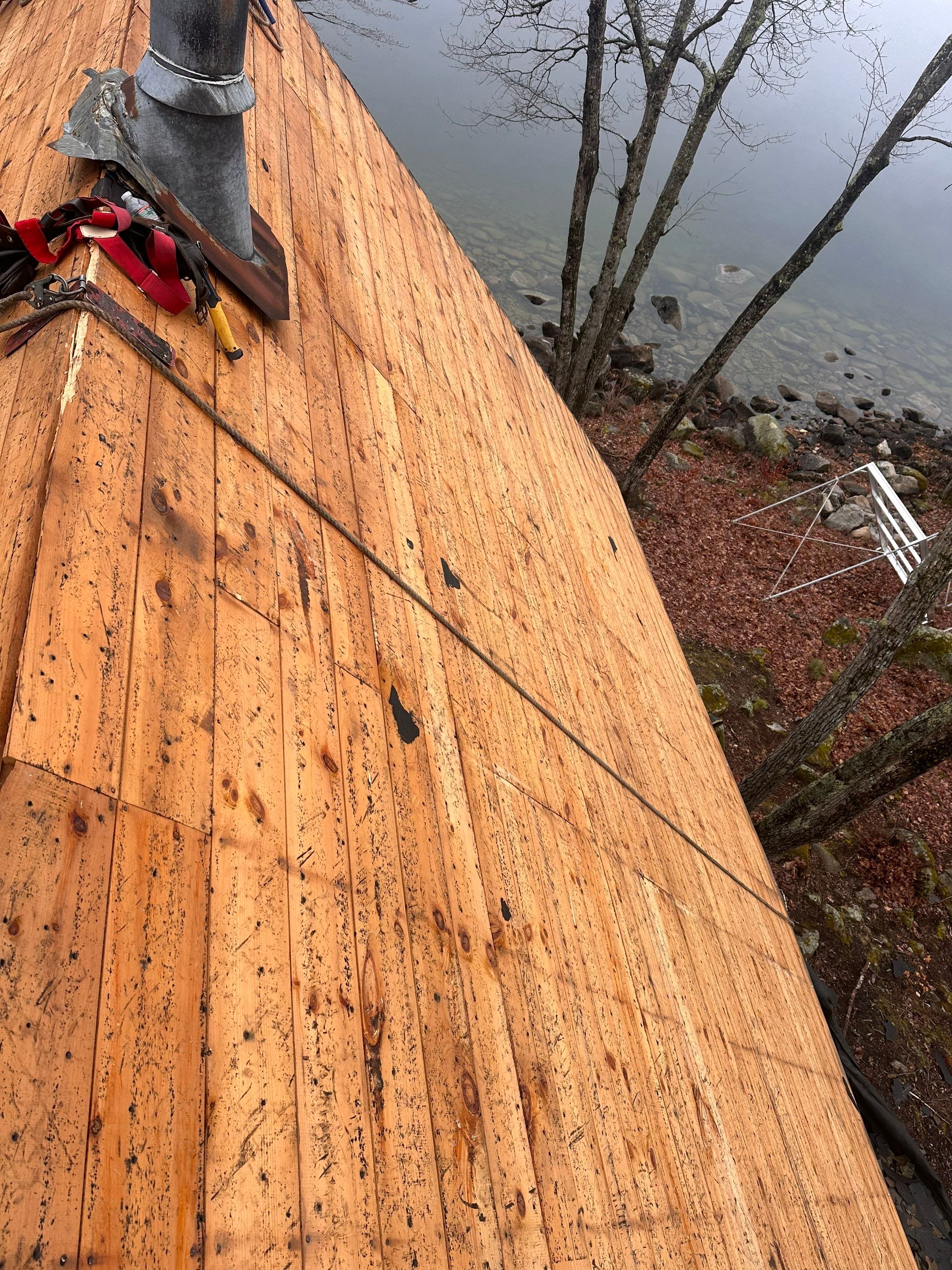 Asphalt Shingle Roof Replacement for Raymond Lakefront A-Frame Cabin by Tall pine roofing