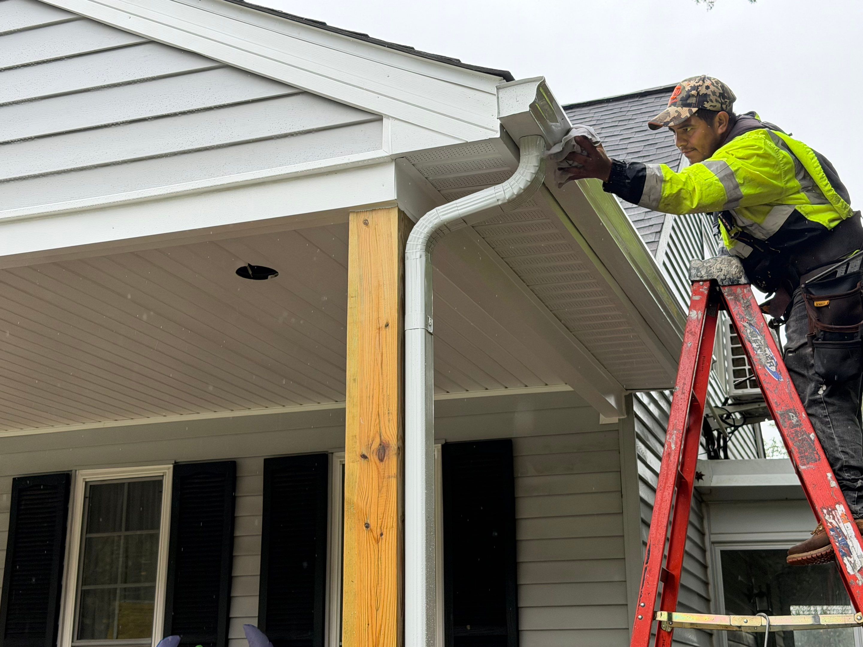 Asphalt Shingle Roof Replacement and Custom Porch Renovation in Hayes by Cade Construction