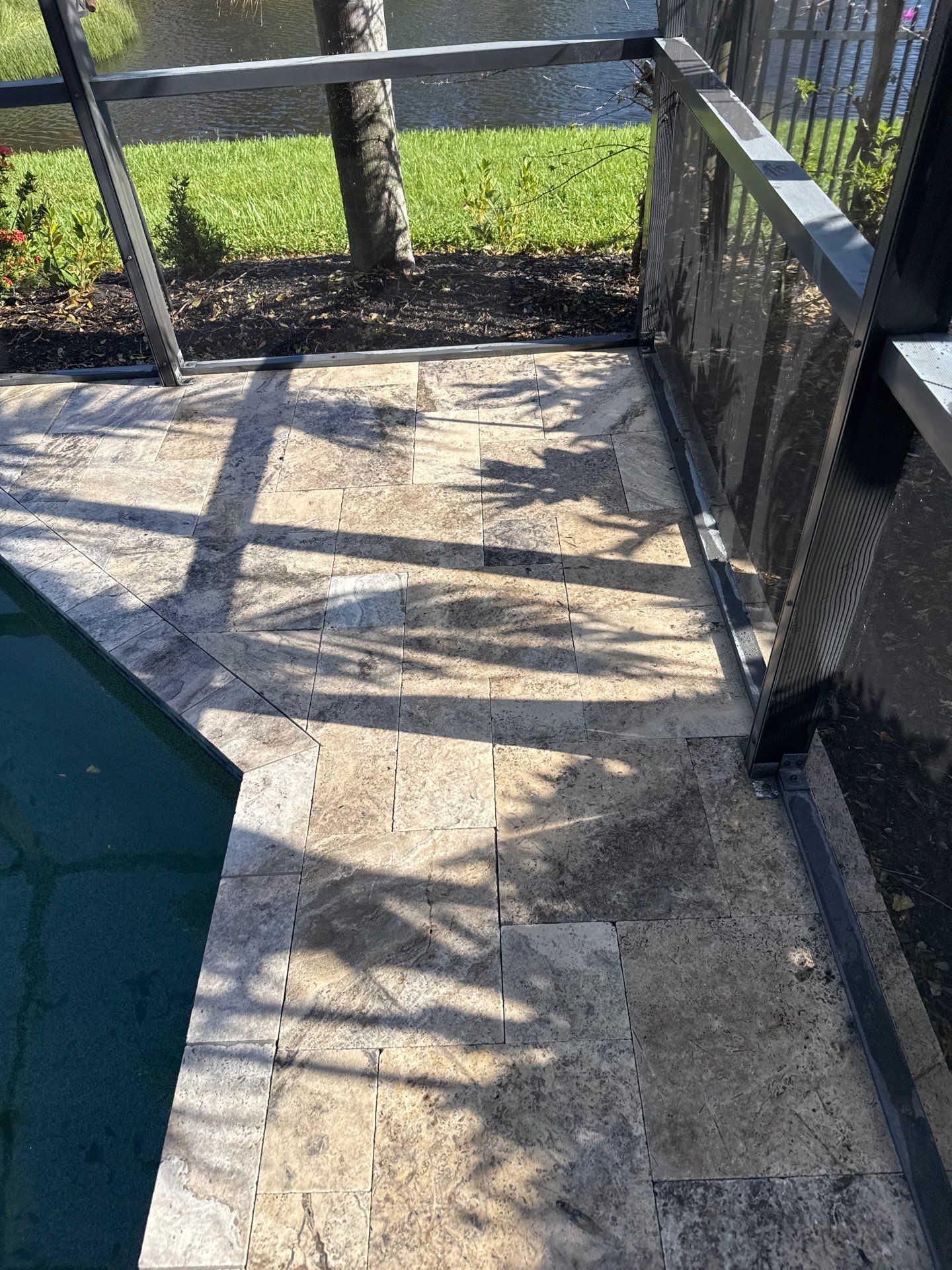 Travertine Pool Deck and Screen Enclosure Cleaning in Ellenton, FL | Oakleaf Hammock Community by Sunshine AquaWash
