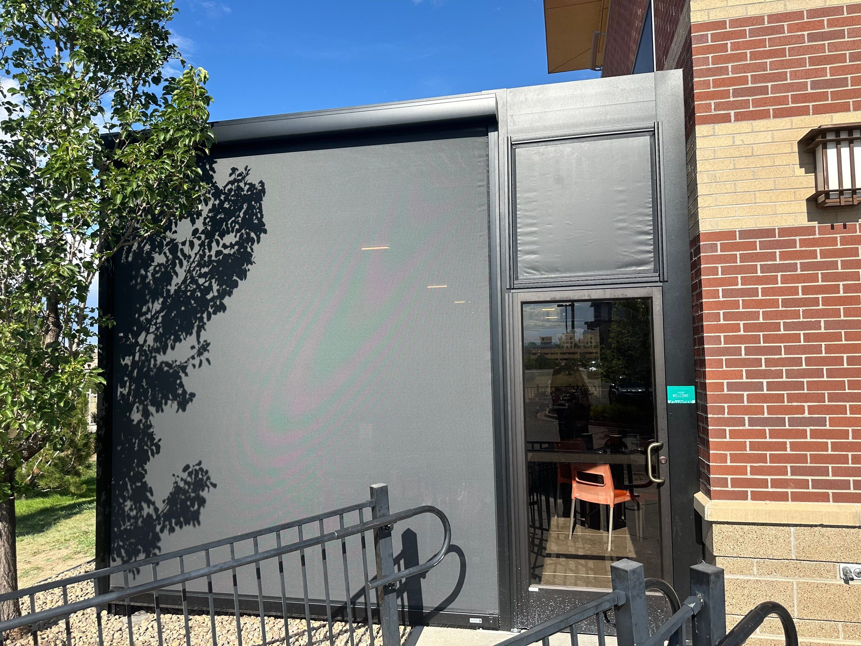 Commercial Azenco Pergola and MagnaTrack Screen Installation in Lone Tree by Outdoor Solutions Colorado
